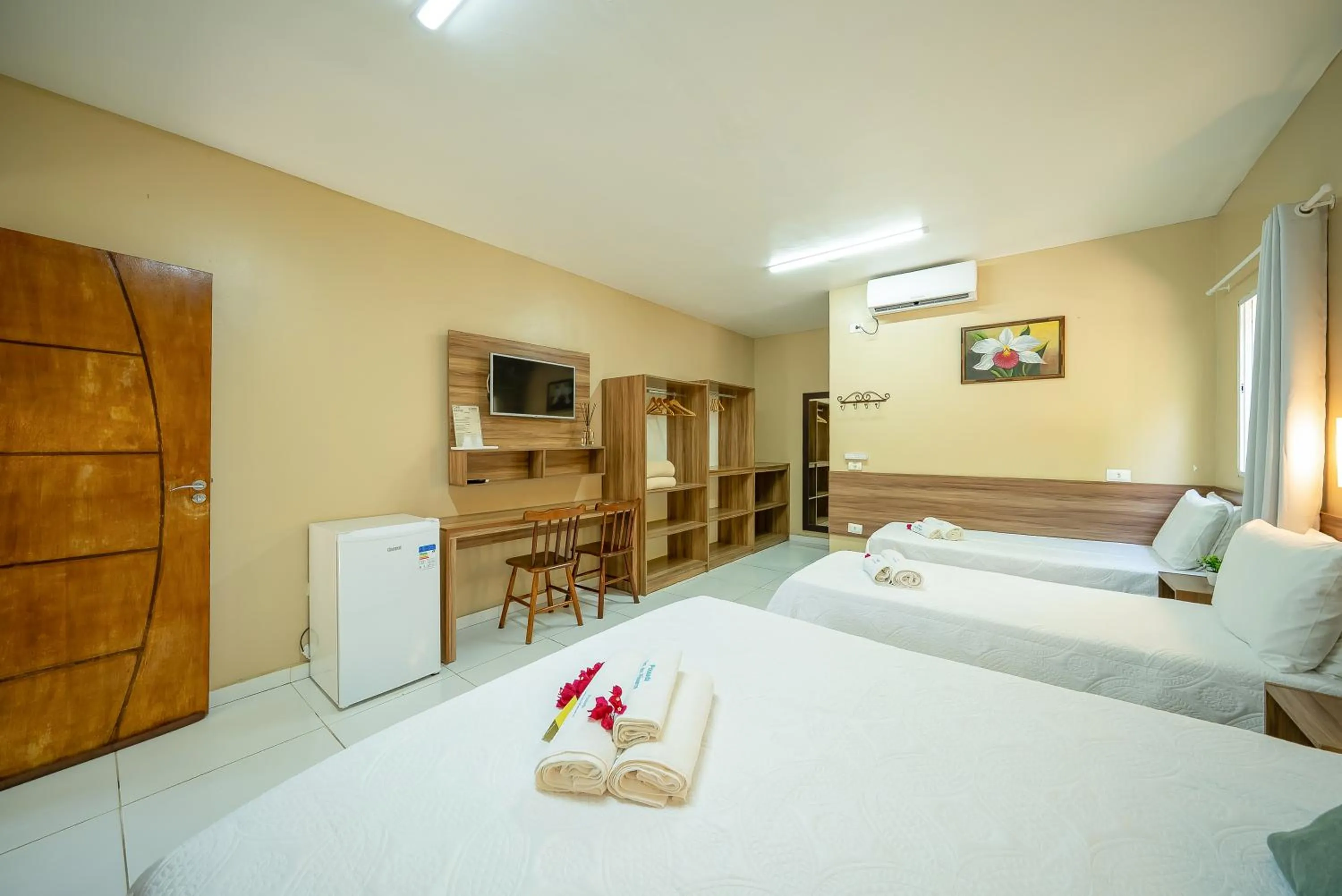 Bed in Pousada Som dos Pássaros