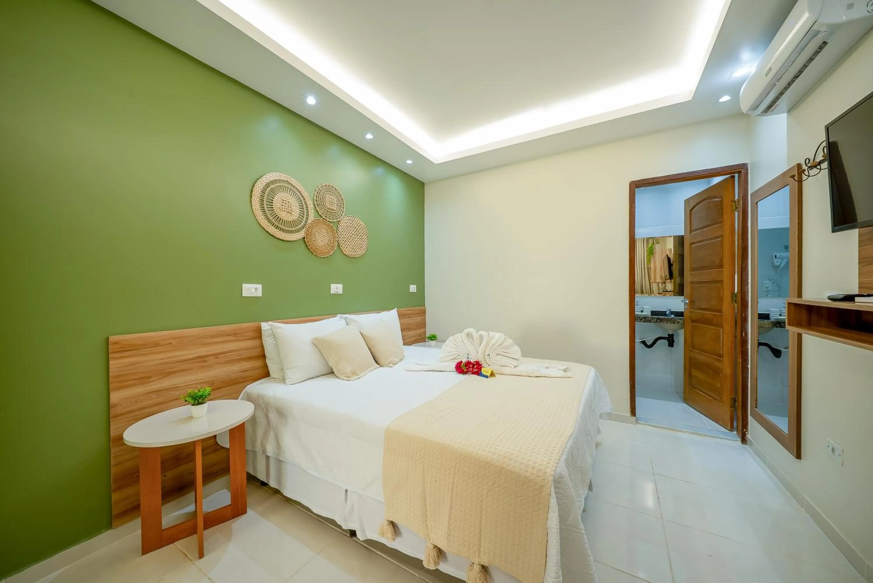 Bed in Pousada Som dos Pássaros