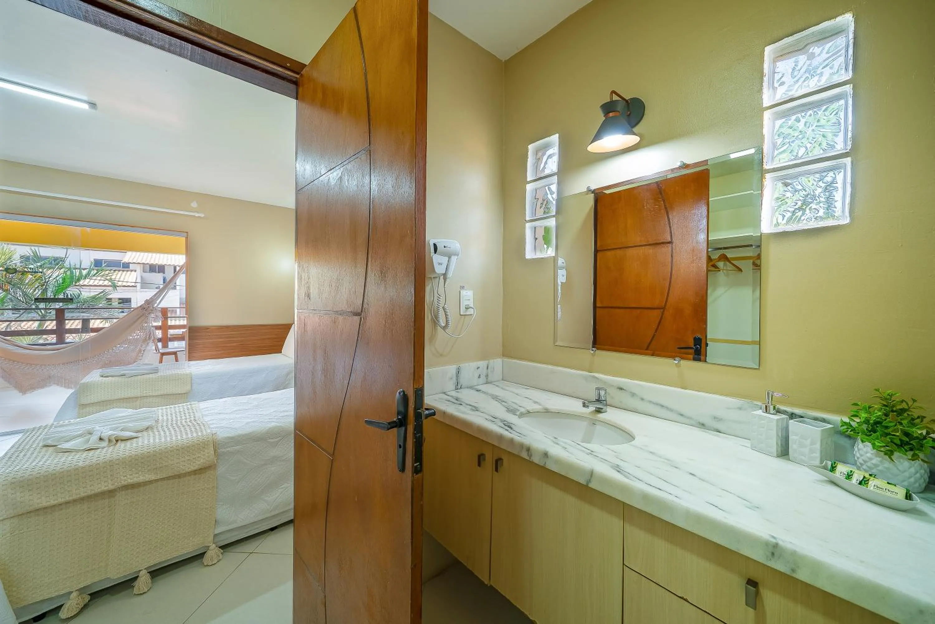 Bed in Pousada Som dos Pássaros