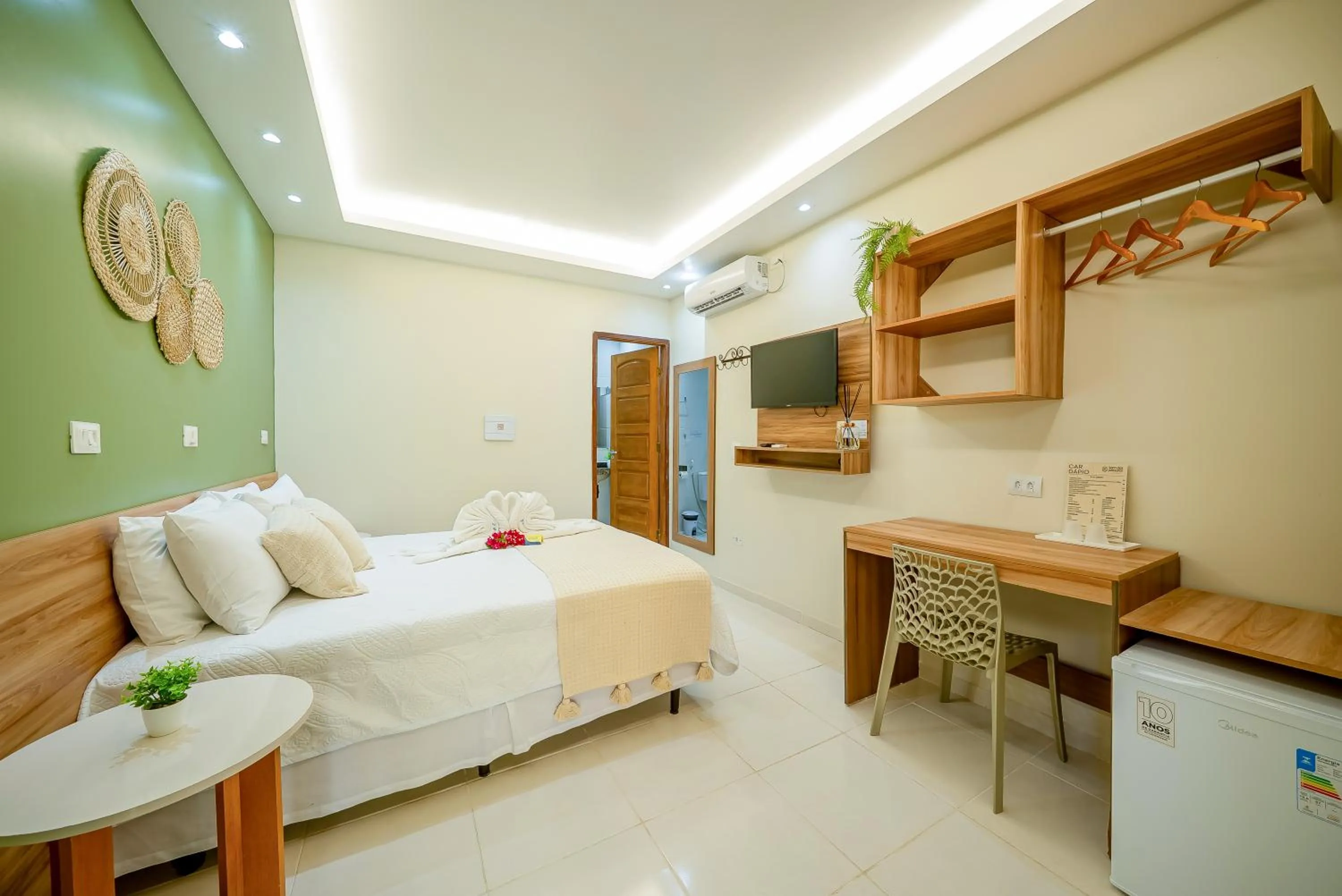 Bed in Pousada Som dos Pássaros