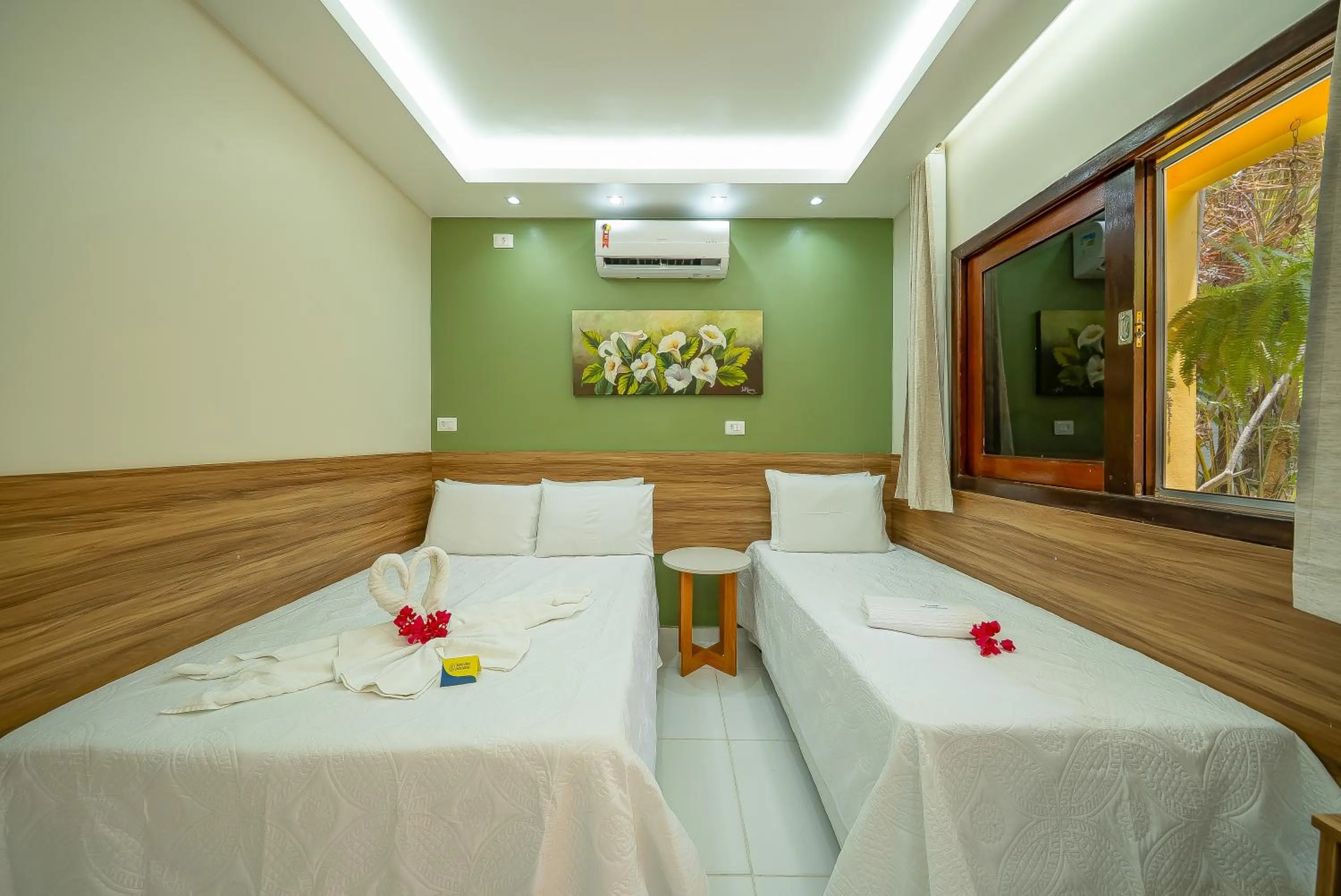 Bed in Pousada Som dos Pássaros