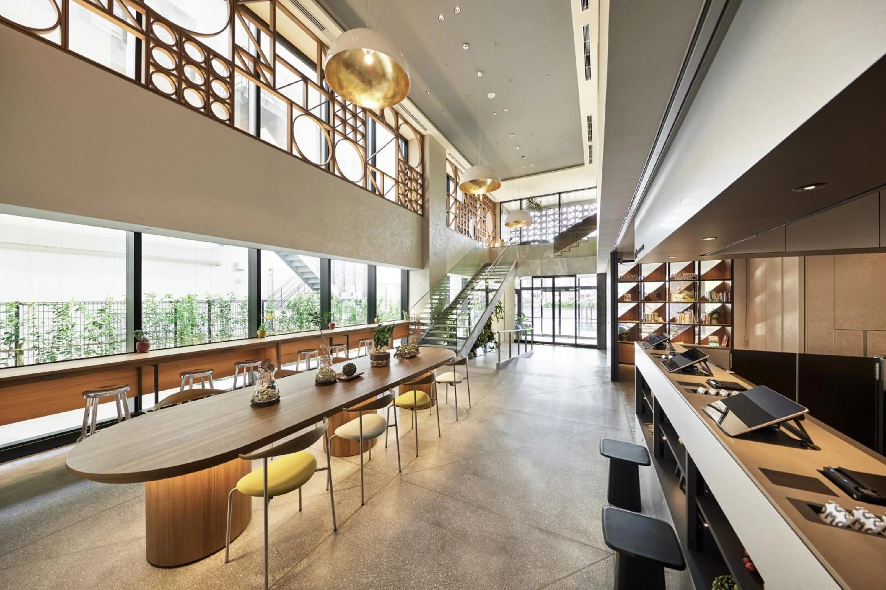 Lounge or bar in OMO5 Okinawa Naha by Hoshino Resorts