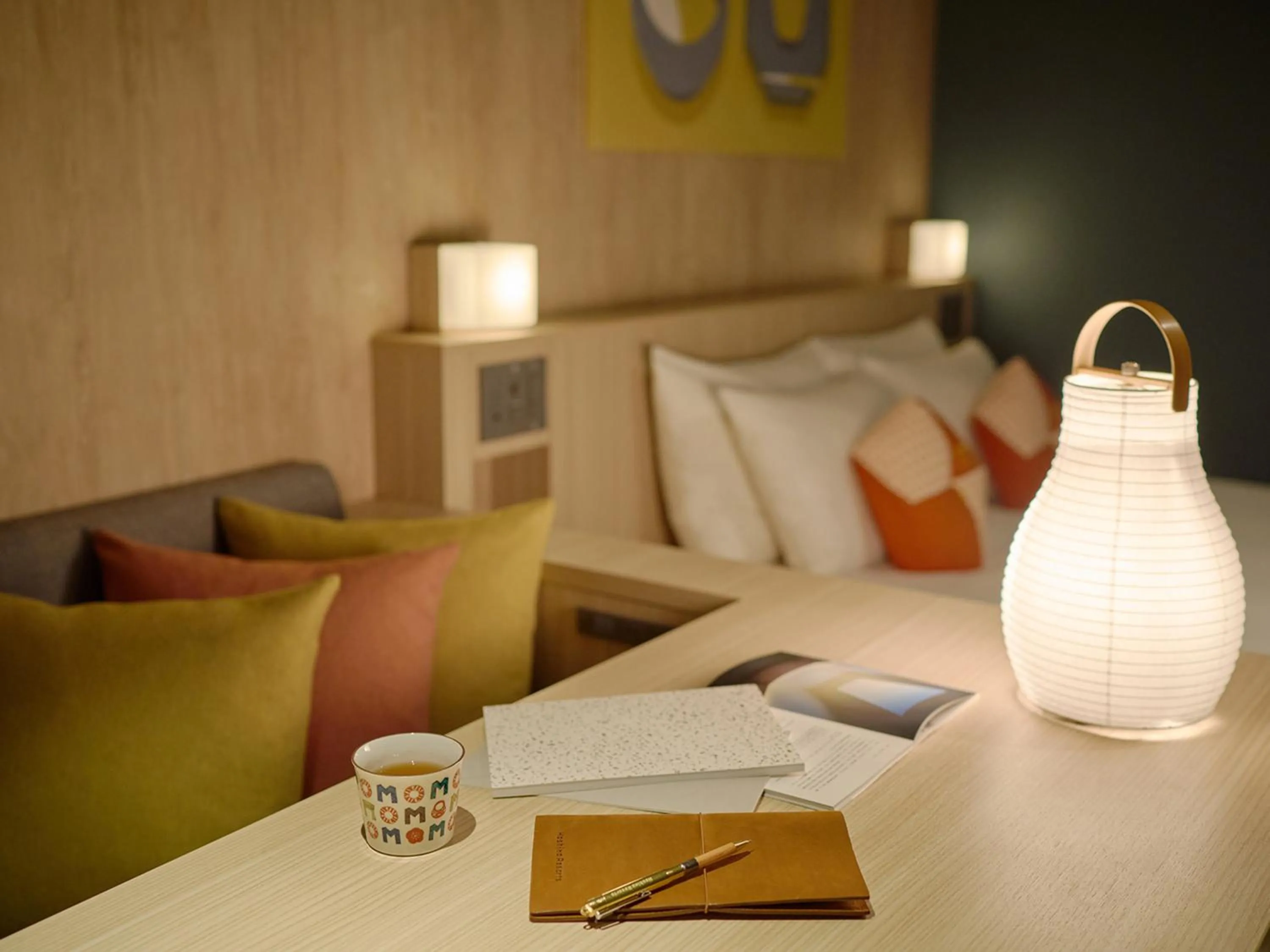 Living room, Bed in OMO5 Kanazawa Katamachi by Hoshino Resorts