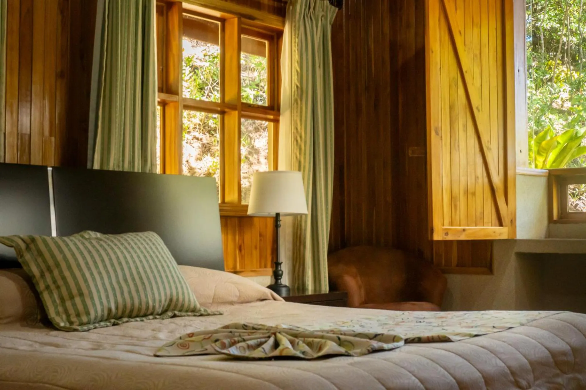 Bed in Los Pinos Cabins & Reserve