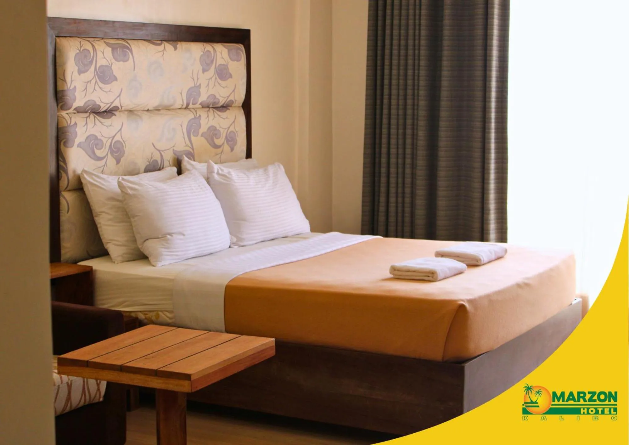 Bed in MARZON HOTEL KALIBO