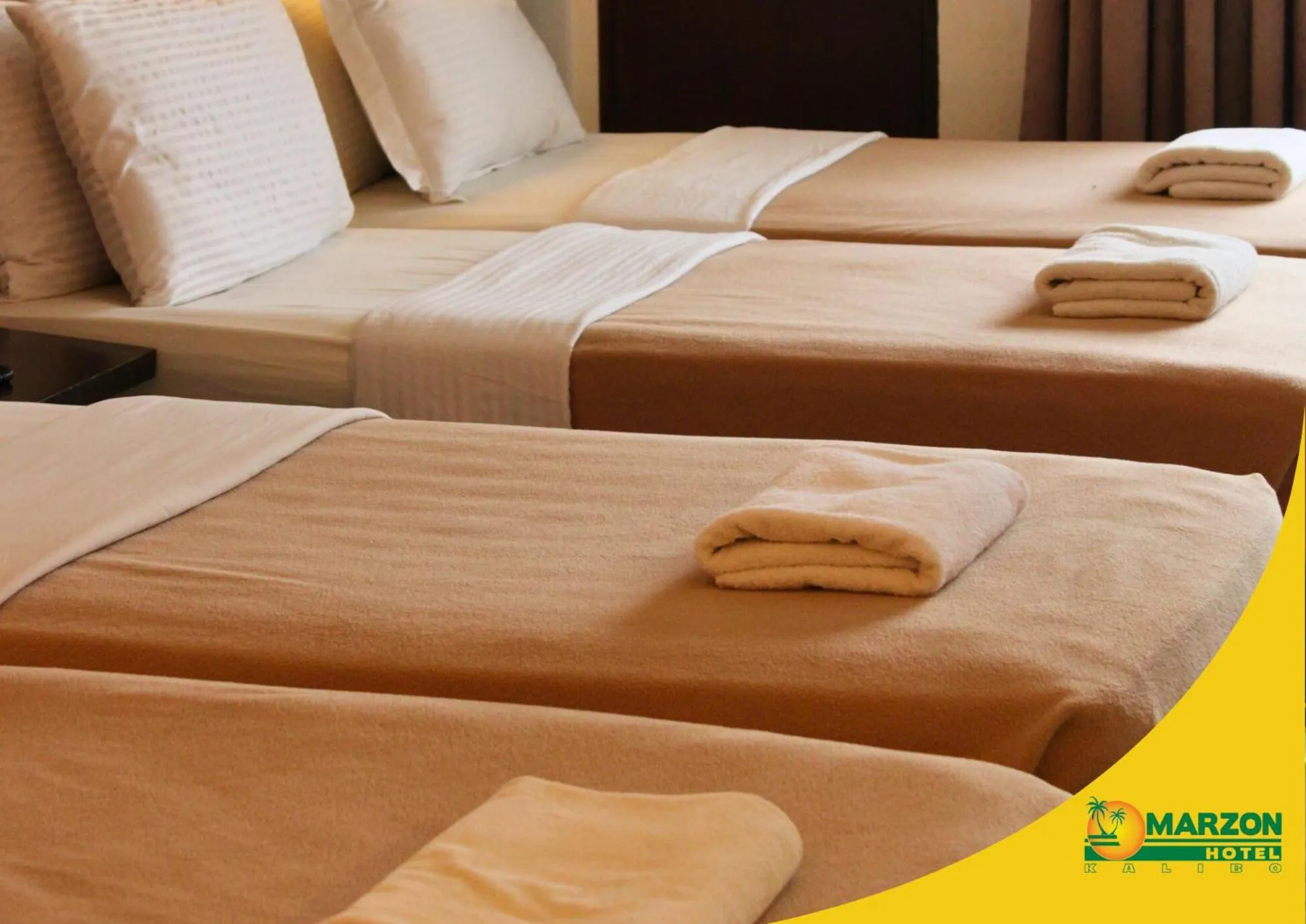 Bed in MARZON HOTEL KALIBO