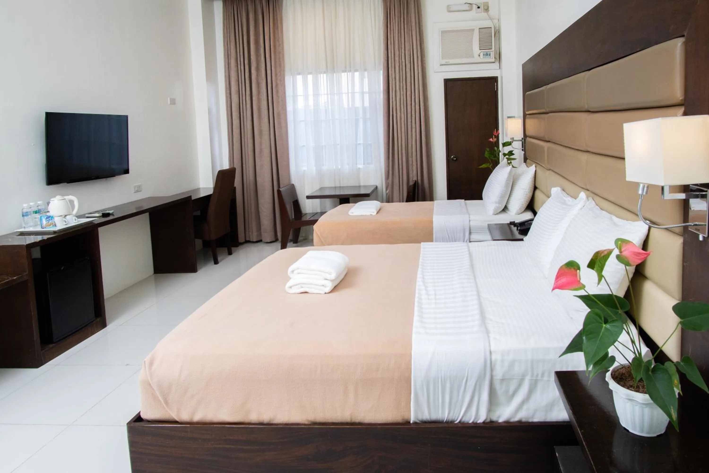 Photo of the whole room, Bed in MARZON HOTEL KALIBO