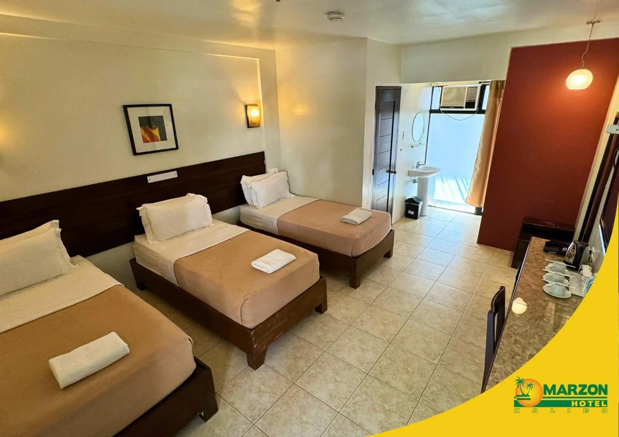 Standard Triple Room in MARZON HOTEL KALIBO Standard Triple Room in MARZON HOTEL KALIBO