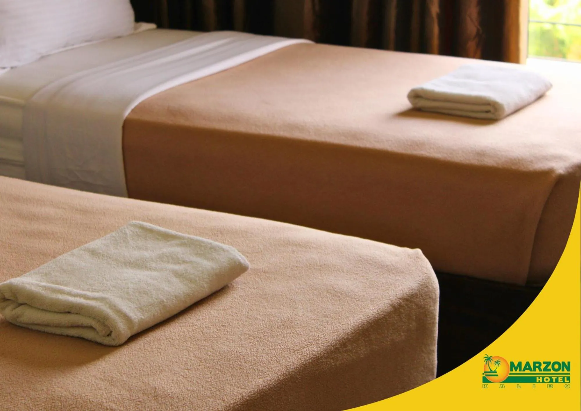 Bed in MARZON HOTEL KALIBO