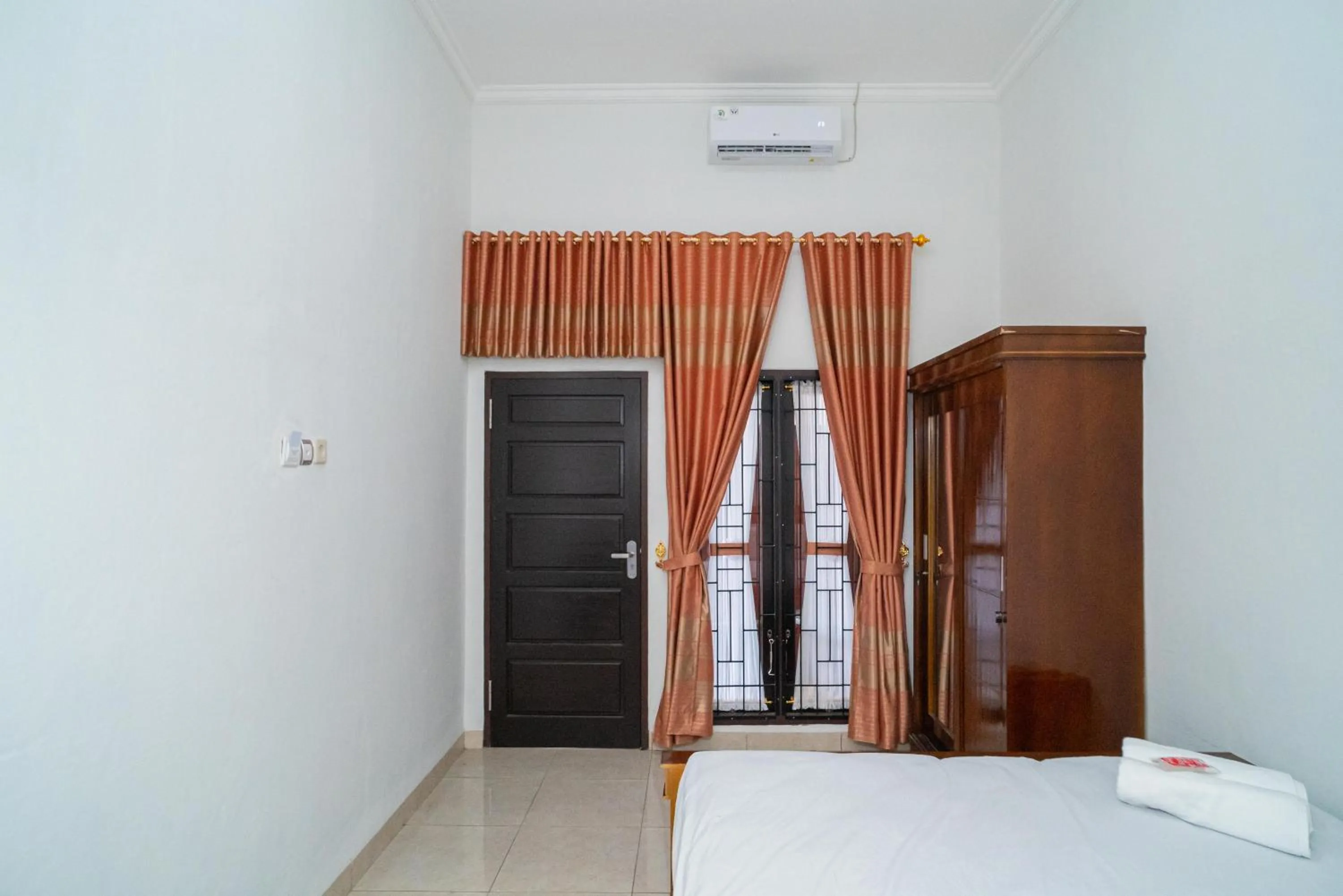 Bed in RedDoorz Syariah @ Jalan Tingang Palangkaraya