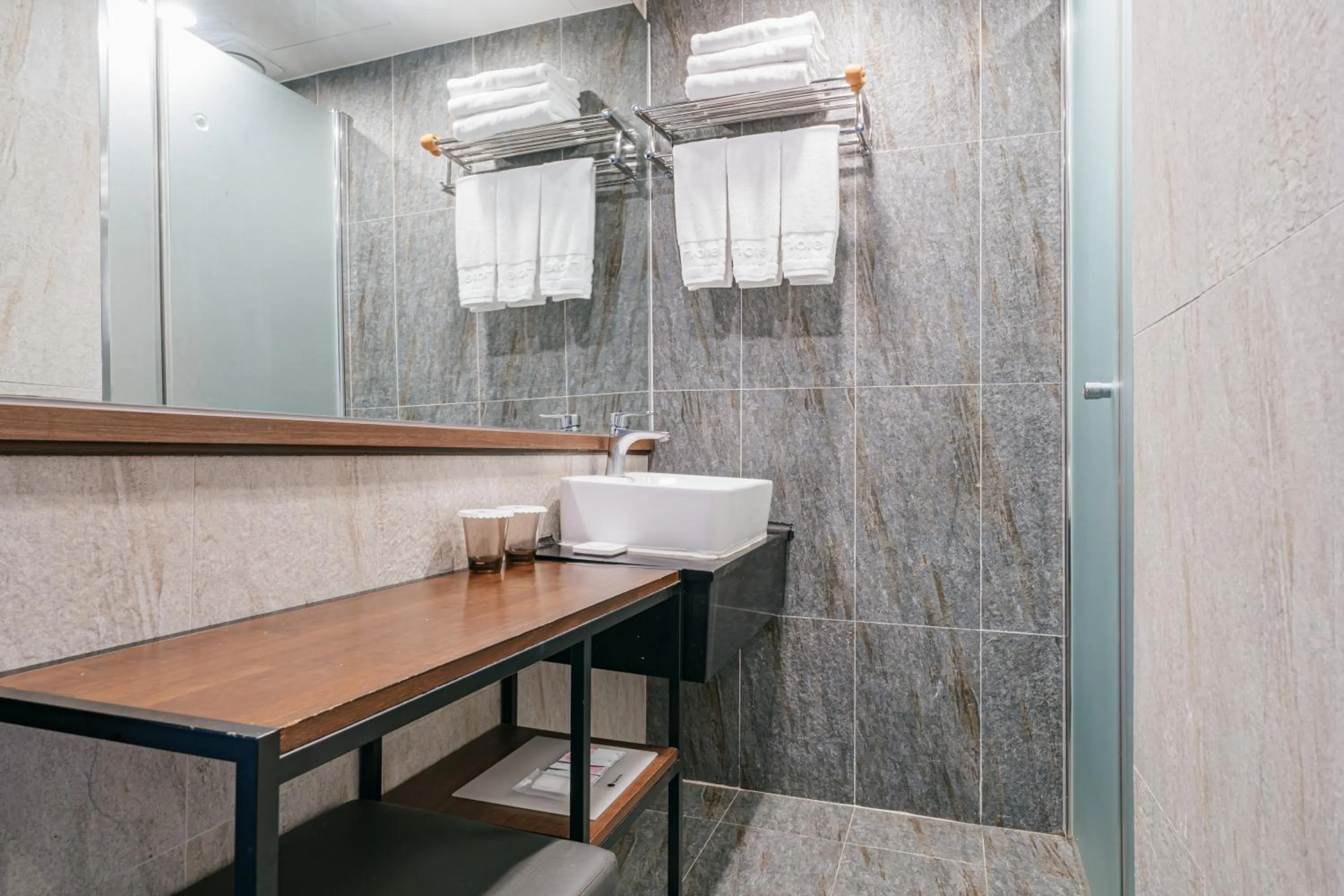 Photo of the whole room in Hotel With City