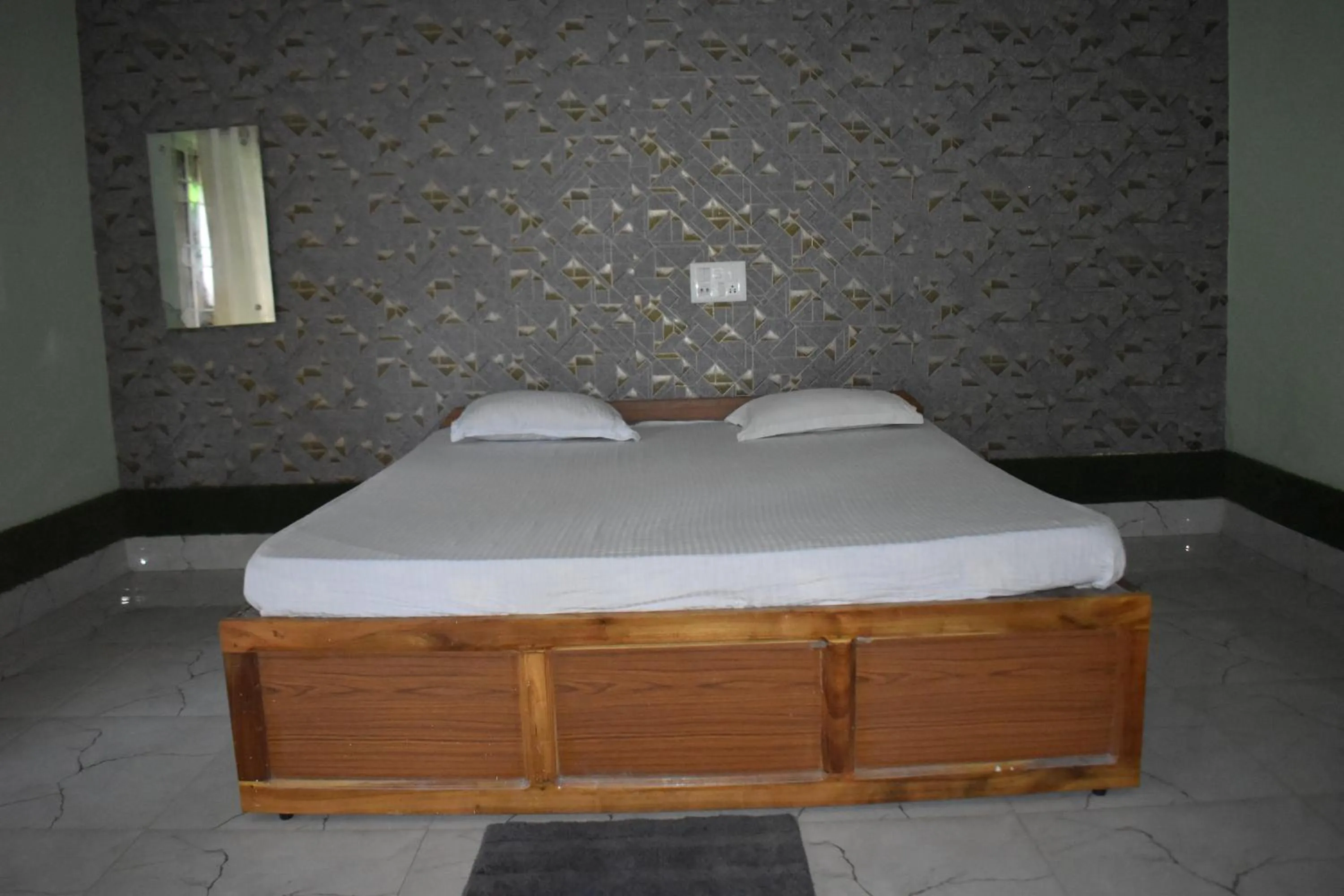 Bed in Kanikasundari Home Stay