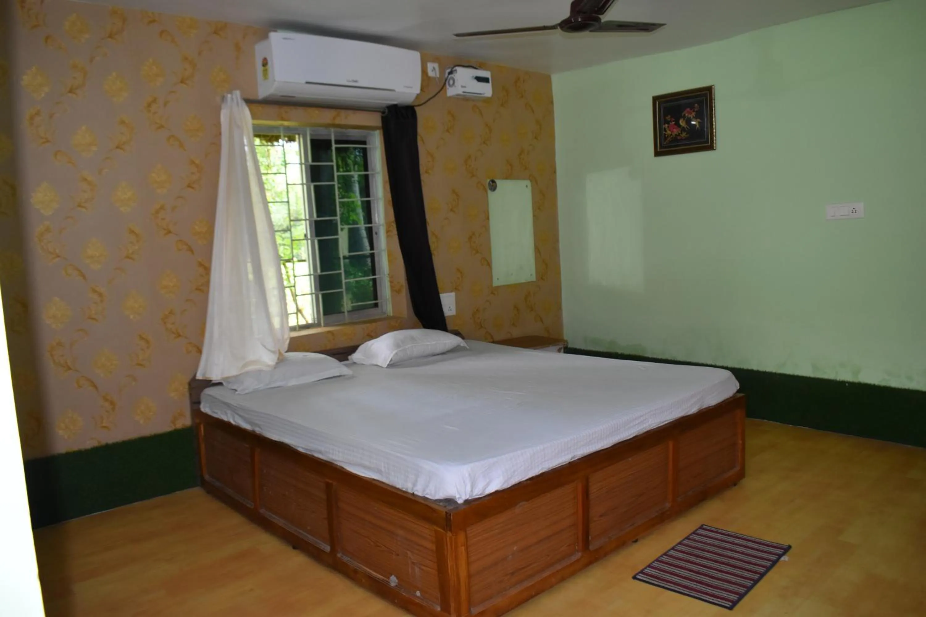 Bed in Kanikasundari Home Stay