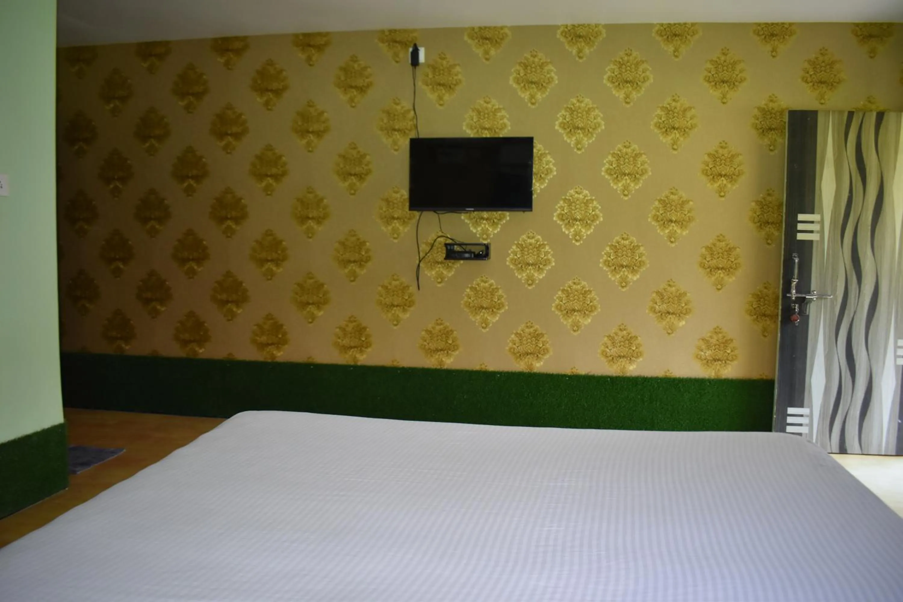 Bed in Kanikasundari Home Stay