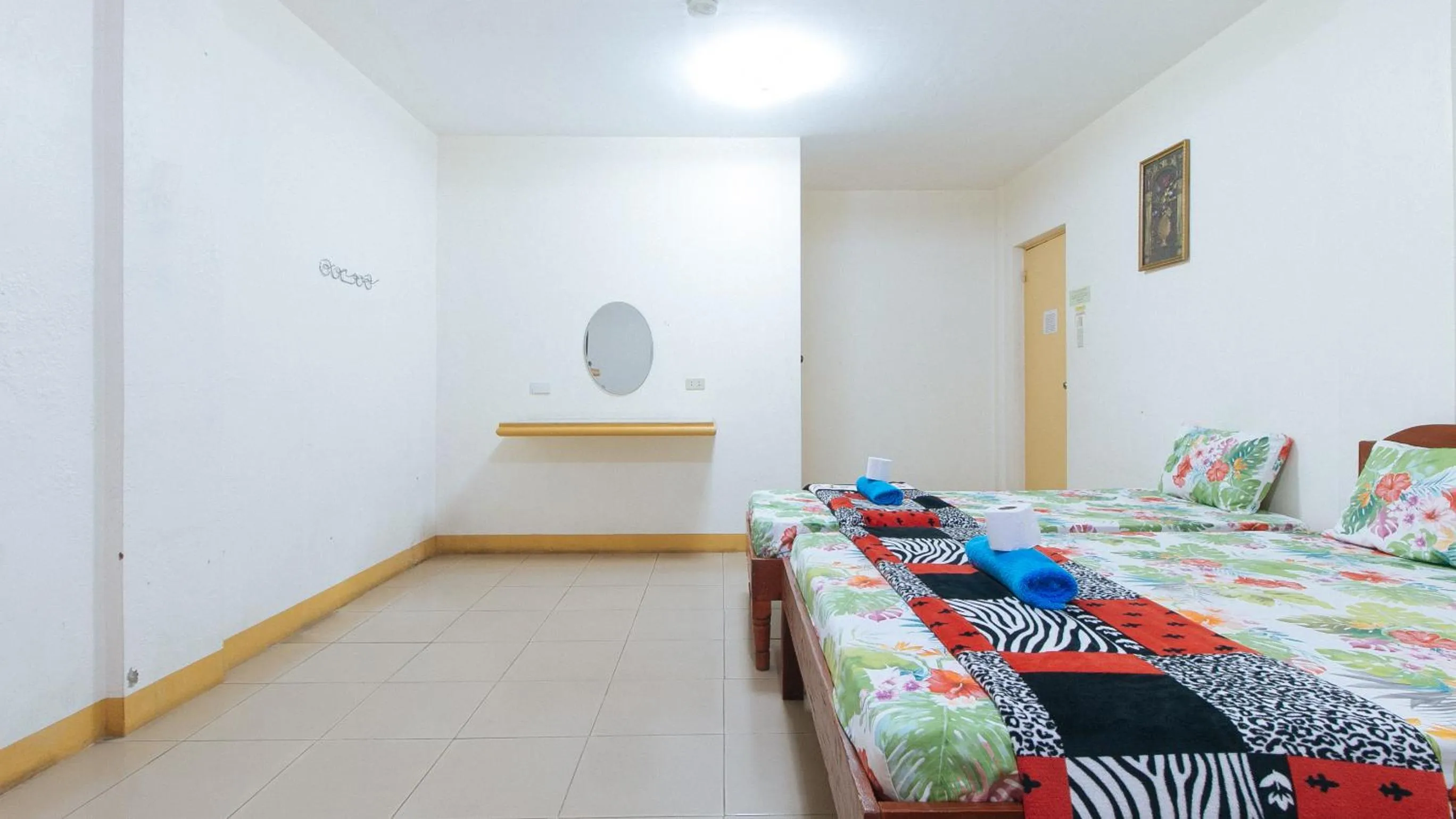 Bed in Golden Success Hotel I by RedDoorz