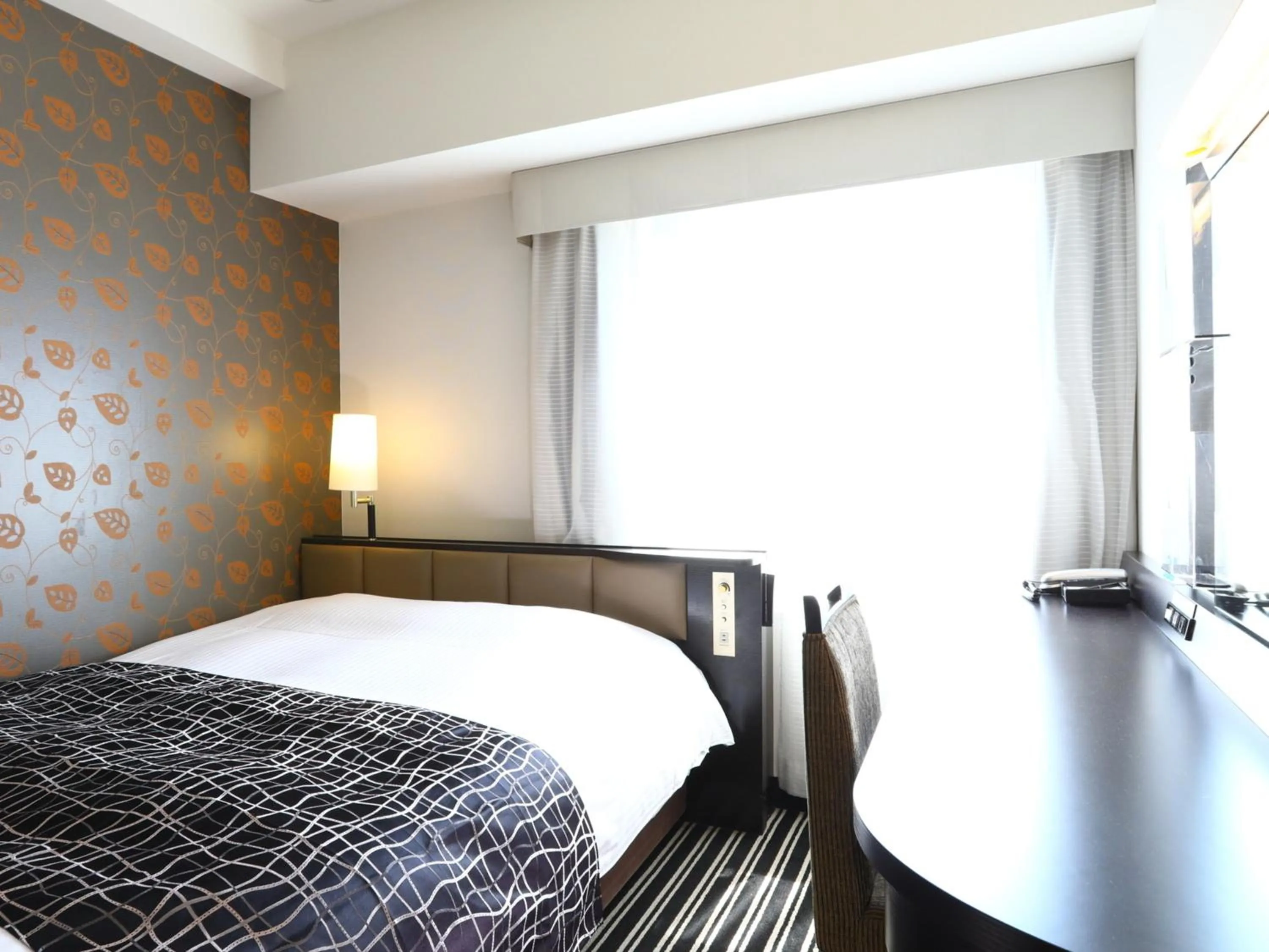 Bed in APA Hotel Shimbashi Toranomon