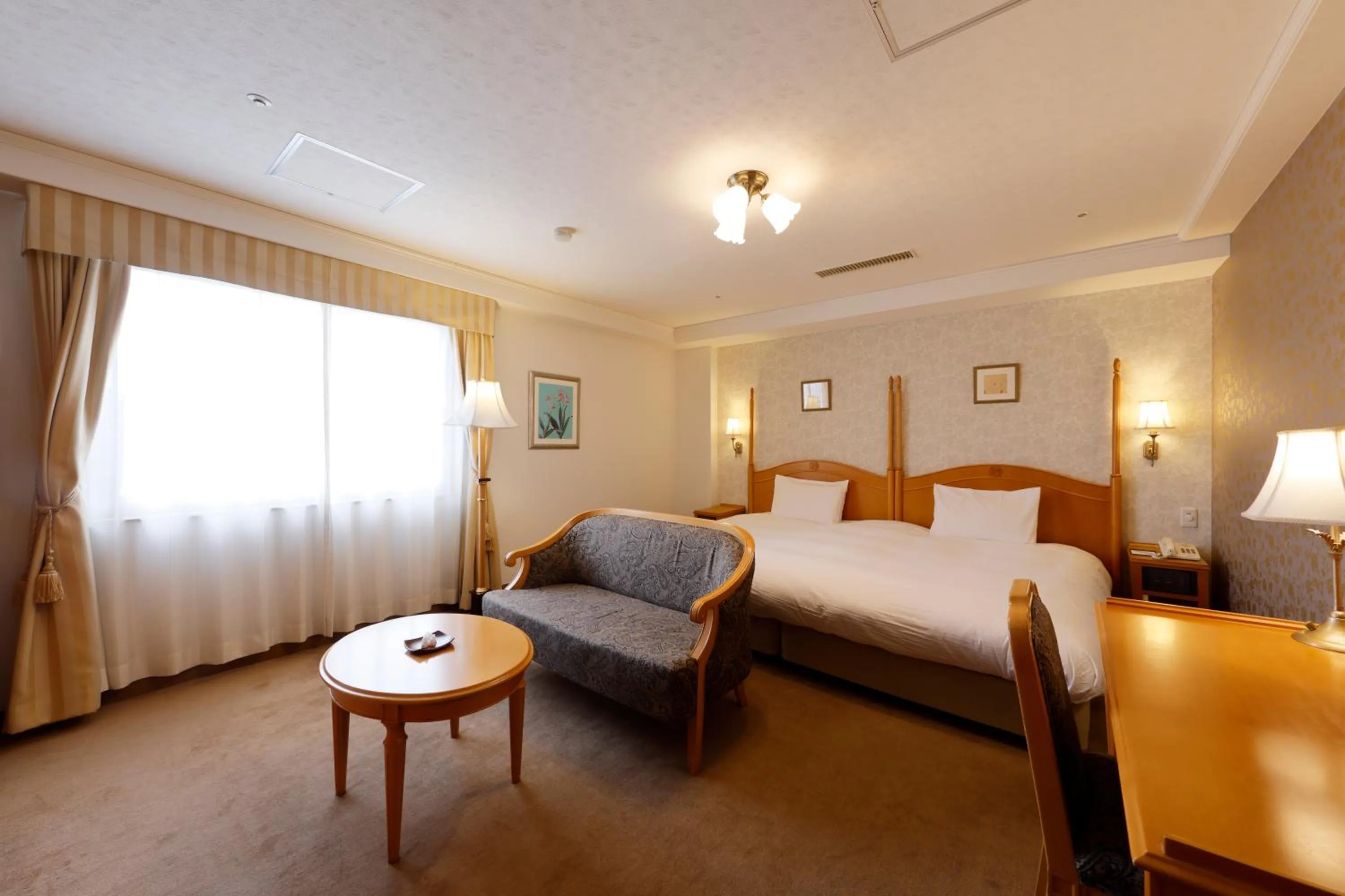 Photo of the whole room, Bed in Kanazawa Hakuchoro Hotel Sanraku -Natural Hot Spring-