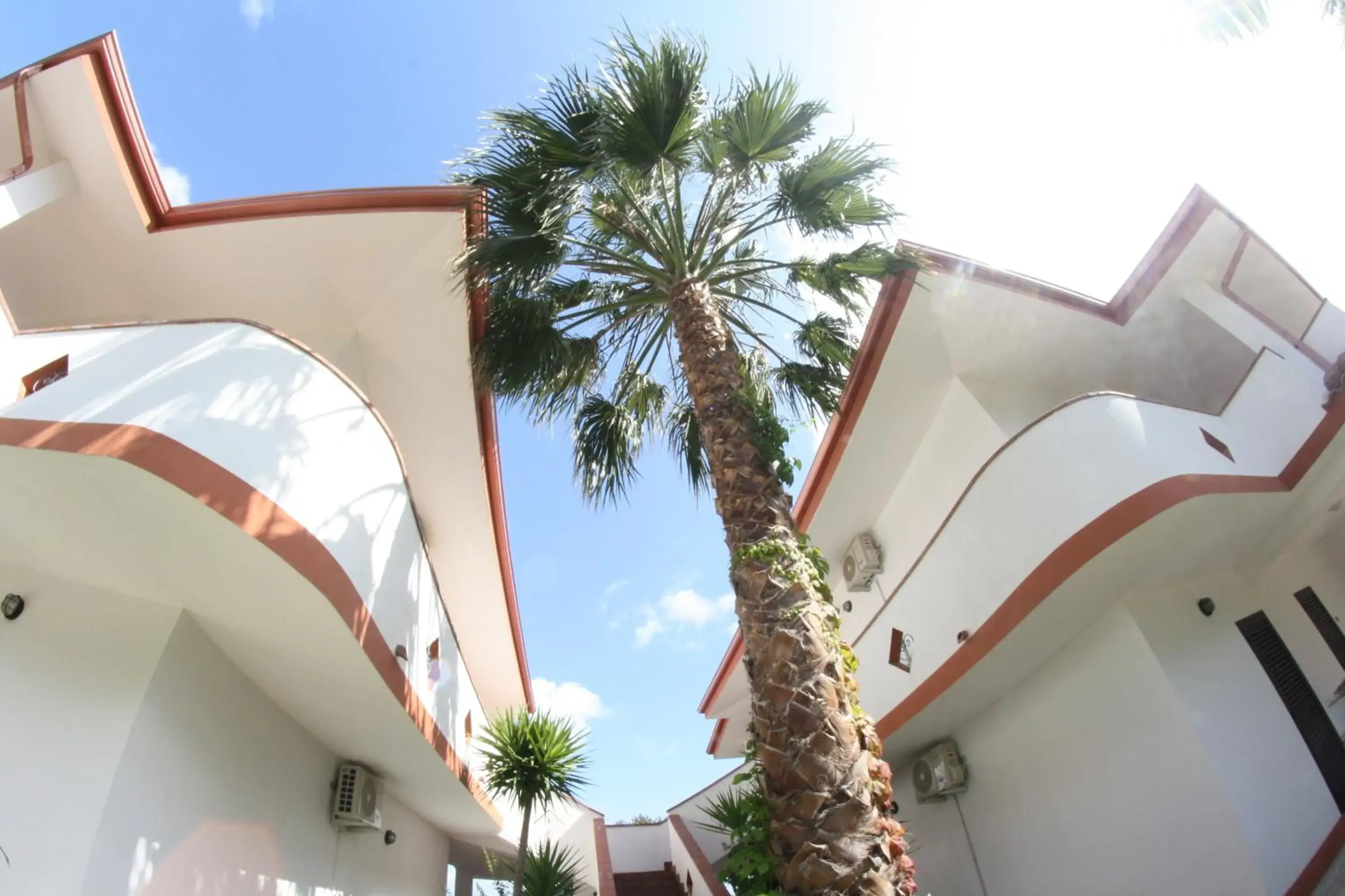 Triple Room in Residence Hotel La Taverna Triple Room in Residence Hotel La Taverna