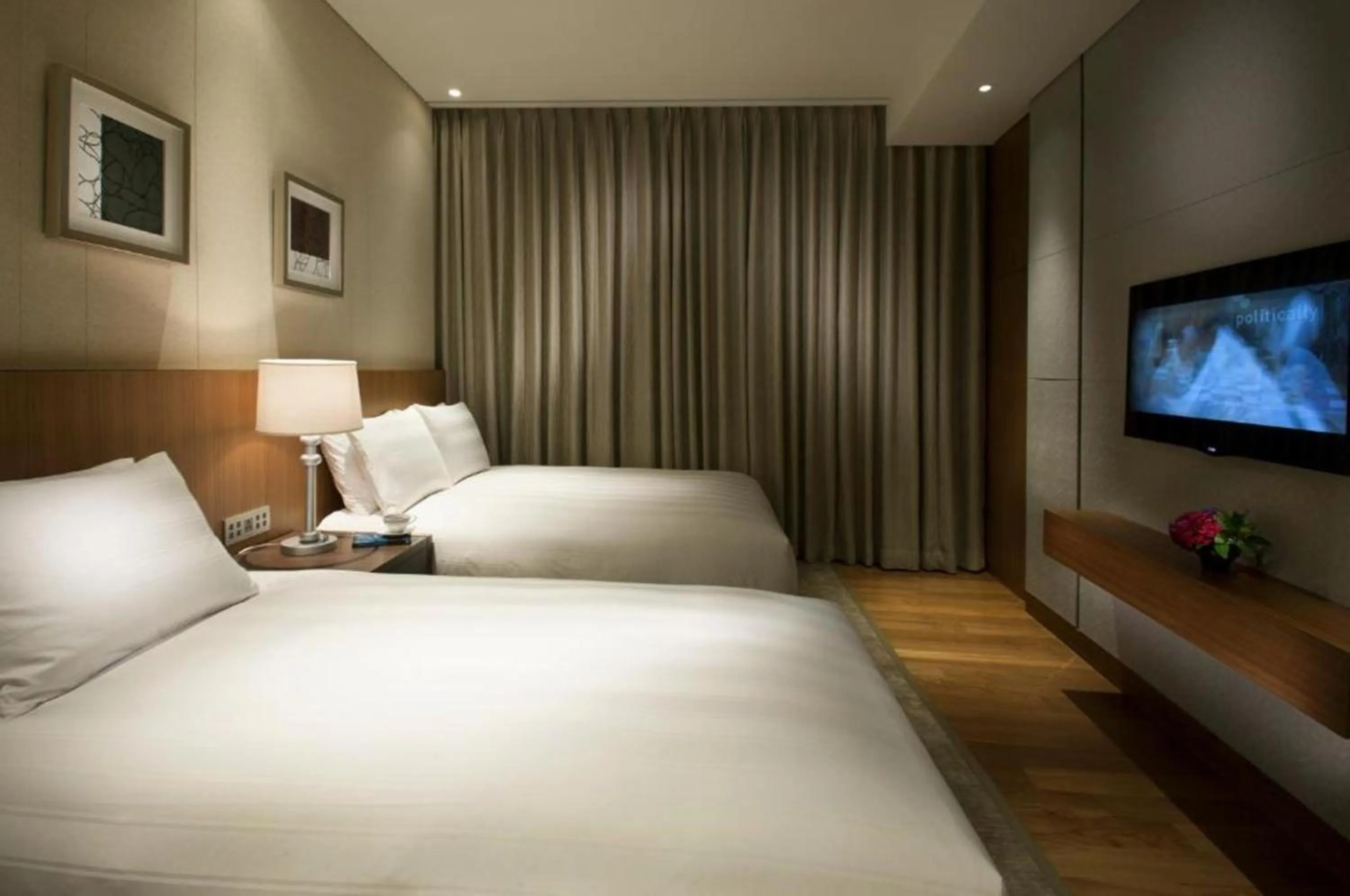 Bed in LOTTE CITY HOTEL Jeju Airport