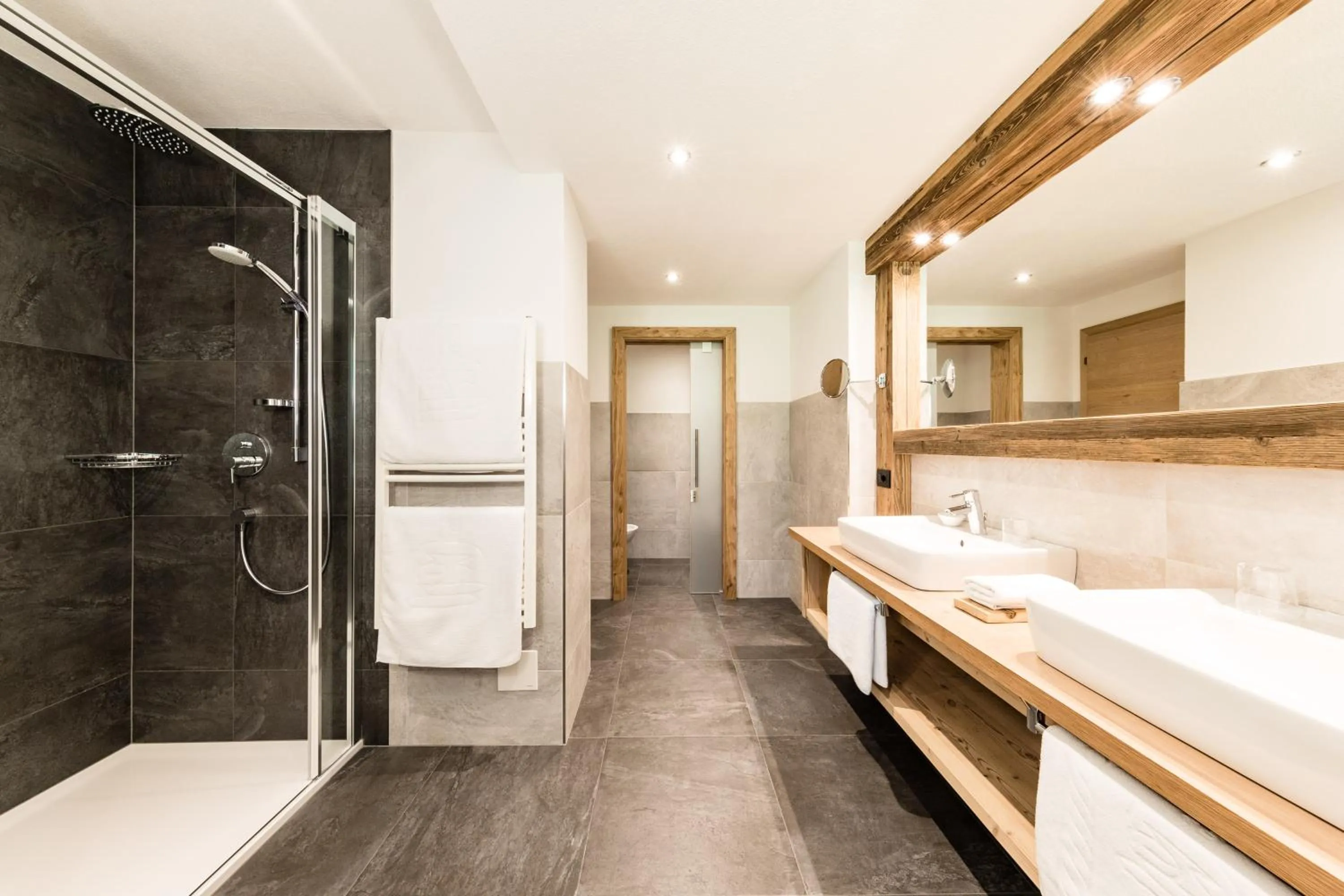 Bathroom in Almhof Hotel Call