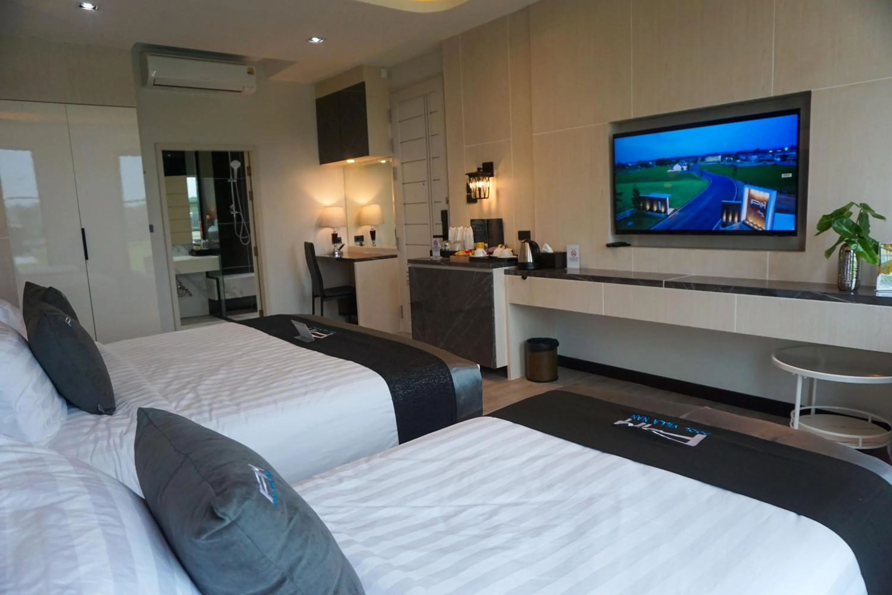 Bed in Pim Pool Villa Nan