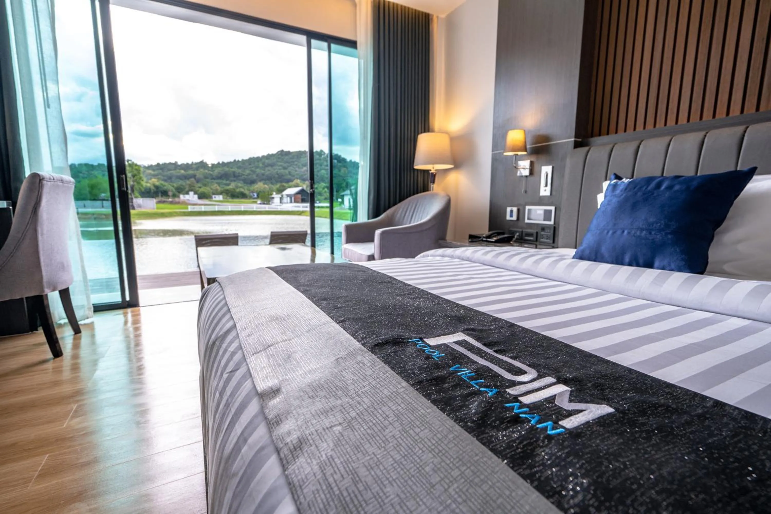 Bed in Pim Pool Villa Nan