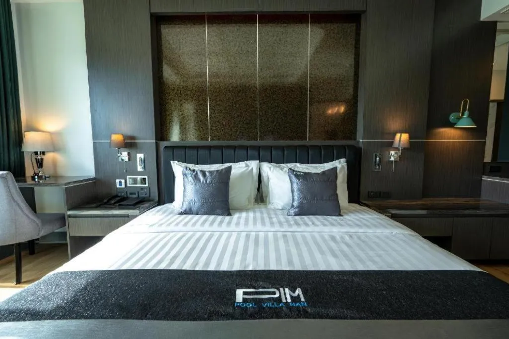 Bed in Pim Pool Villa Nan