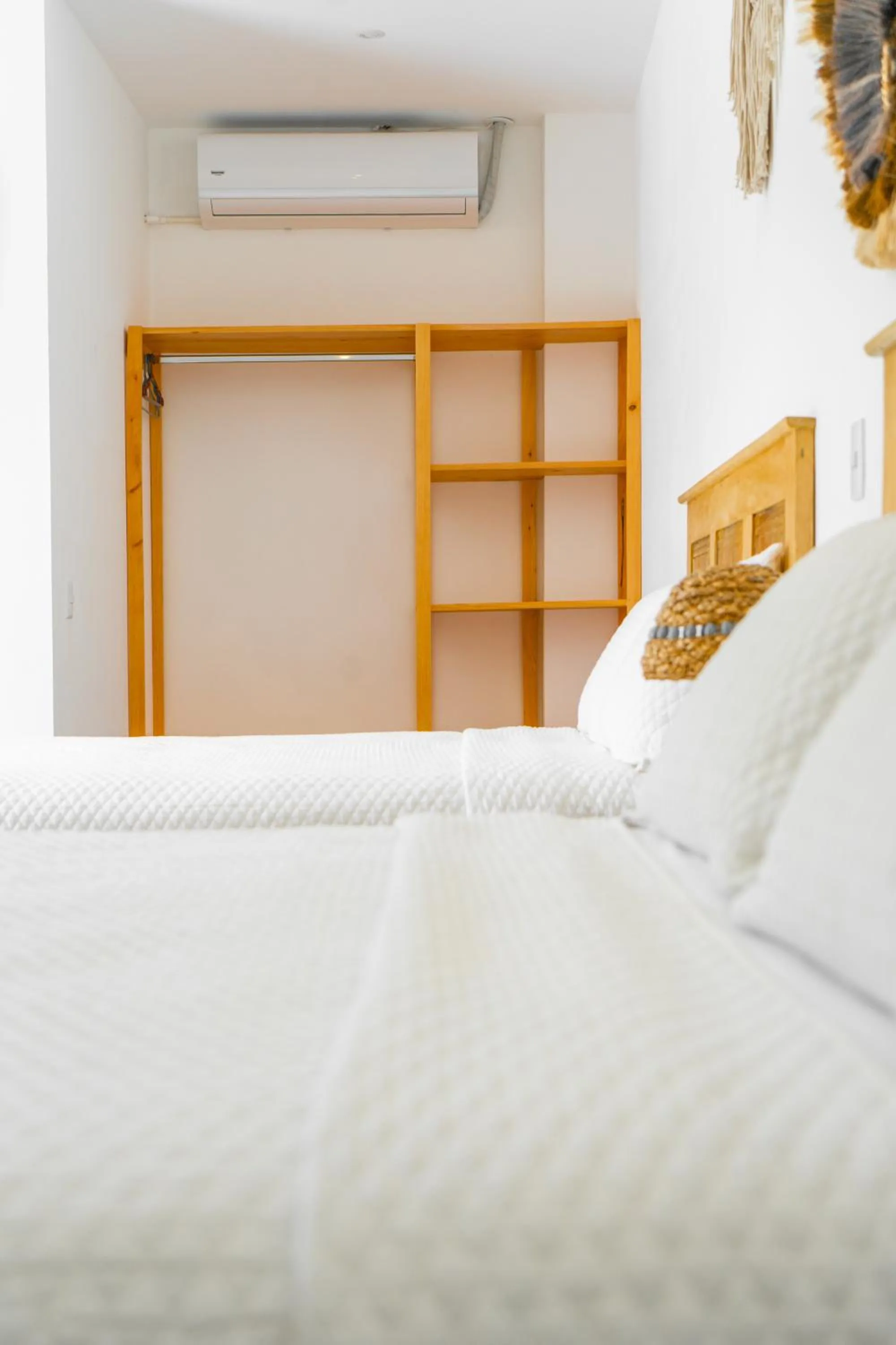 Bed in Equinoccio Hotel