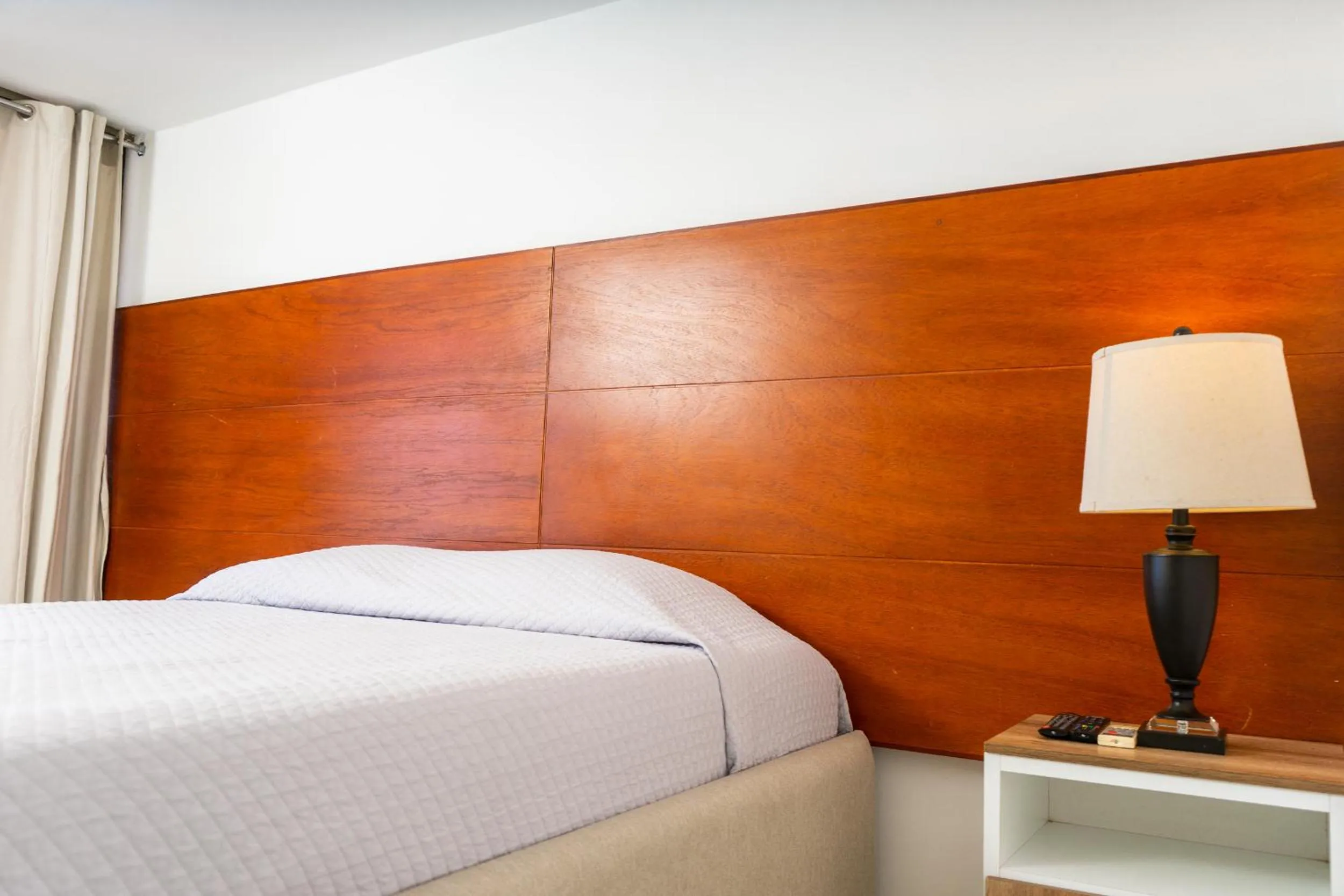 Bed in Equinoccio Hotel