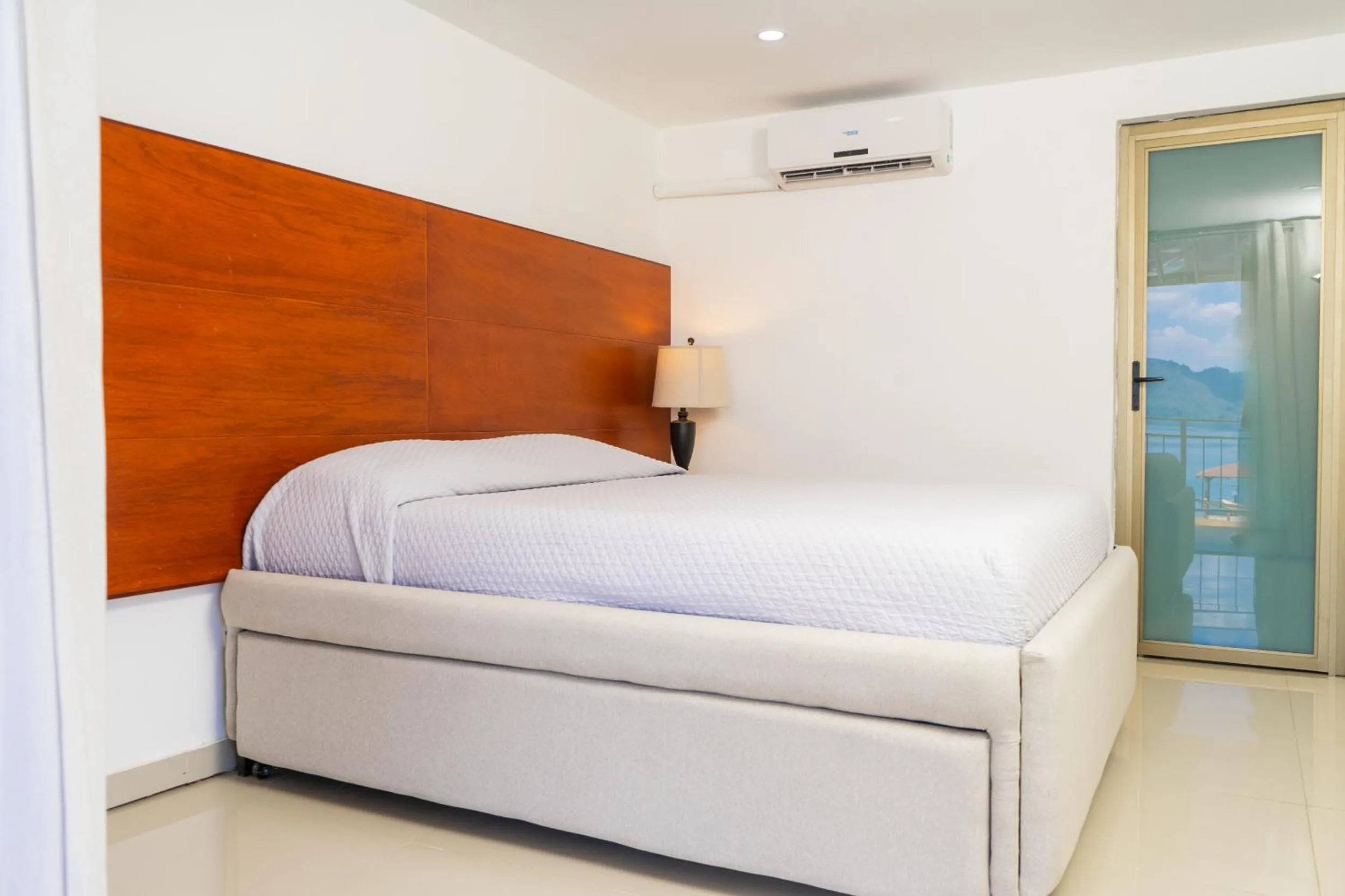 Bed in Equinoccio Hotel