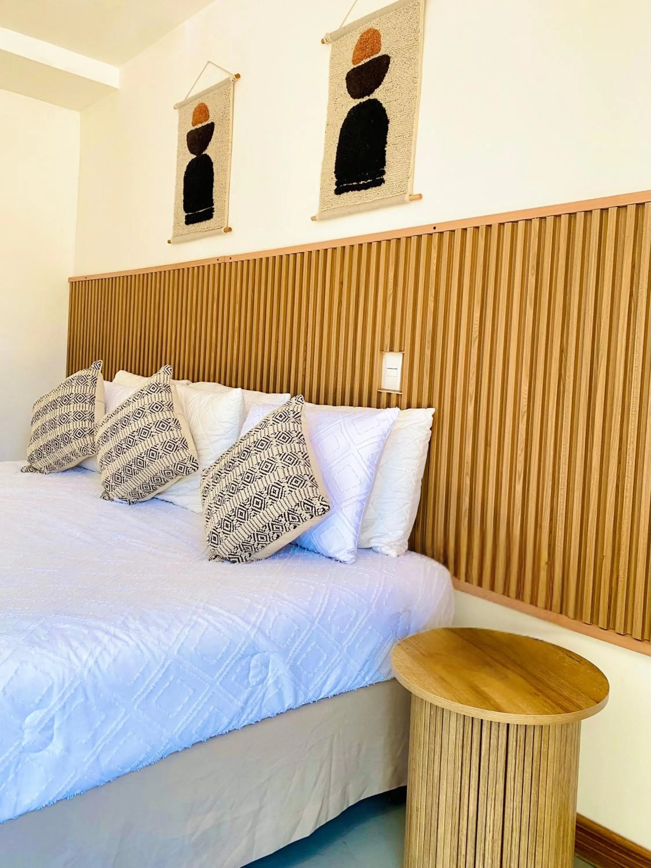 Bed in Equinoccio Hotel