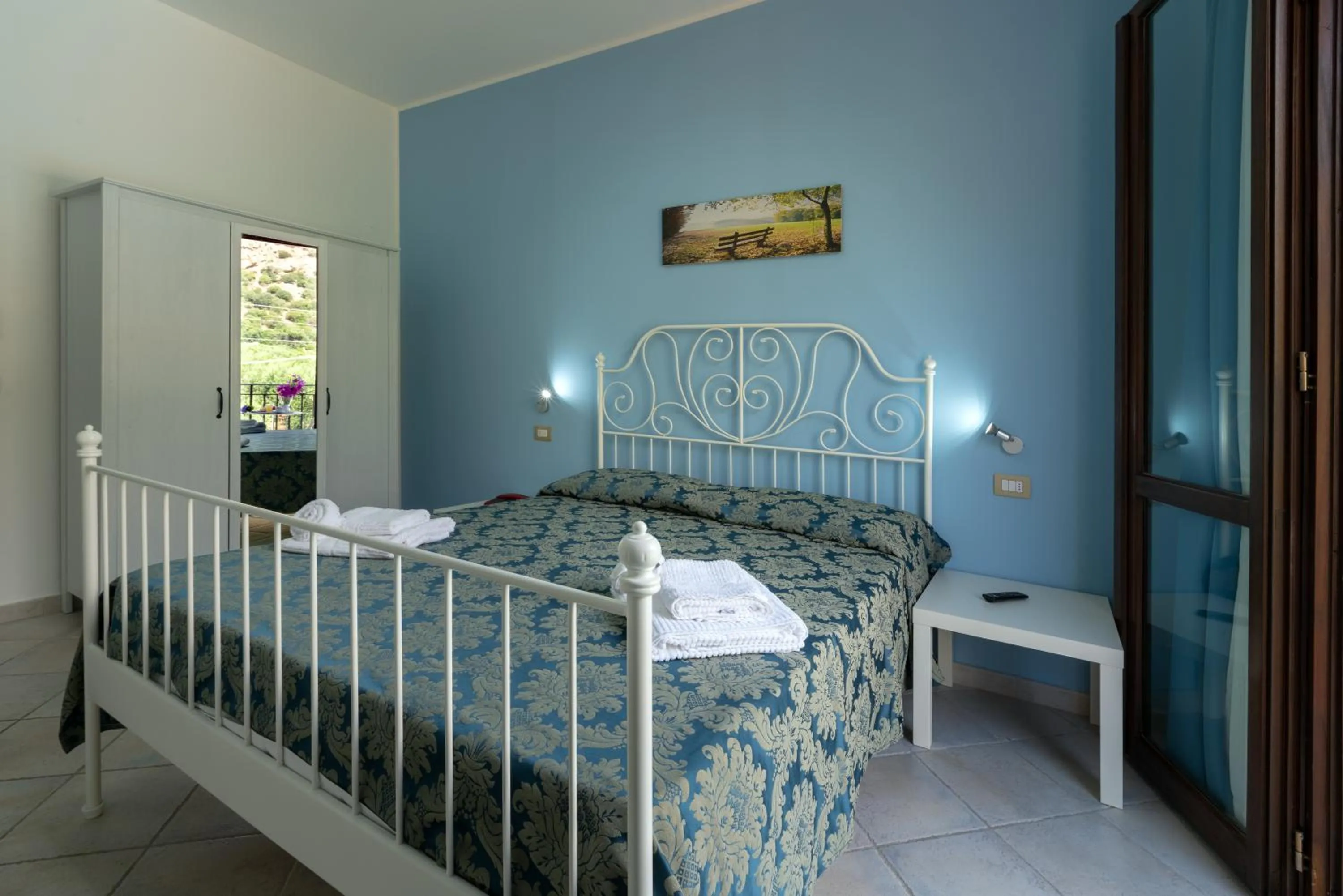 Bed in Hotel Achibea