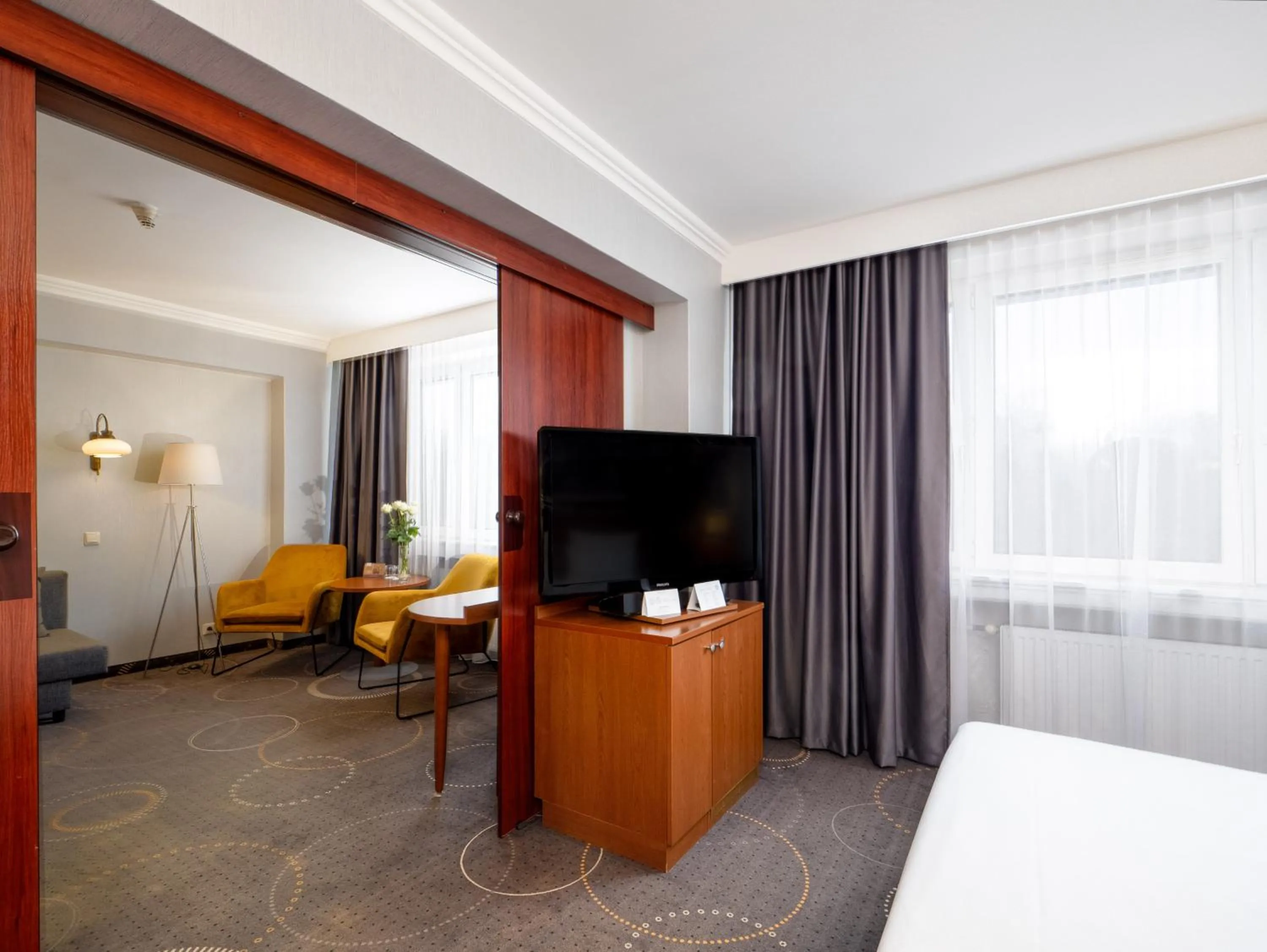 Living room, Bed in Mercure Czestochowa Centrum