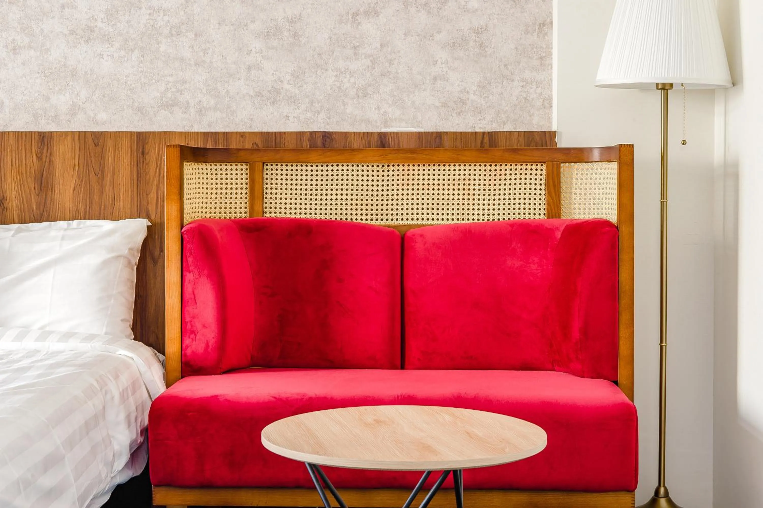 Seating area, Bed in Choco Style Inn