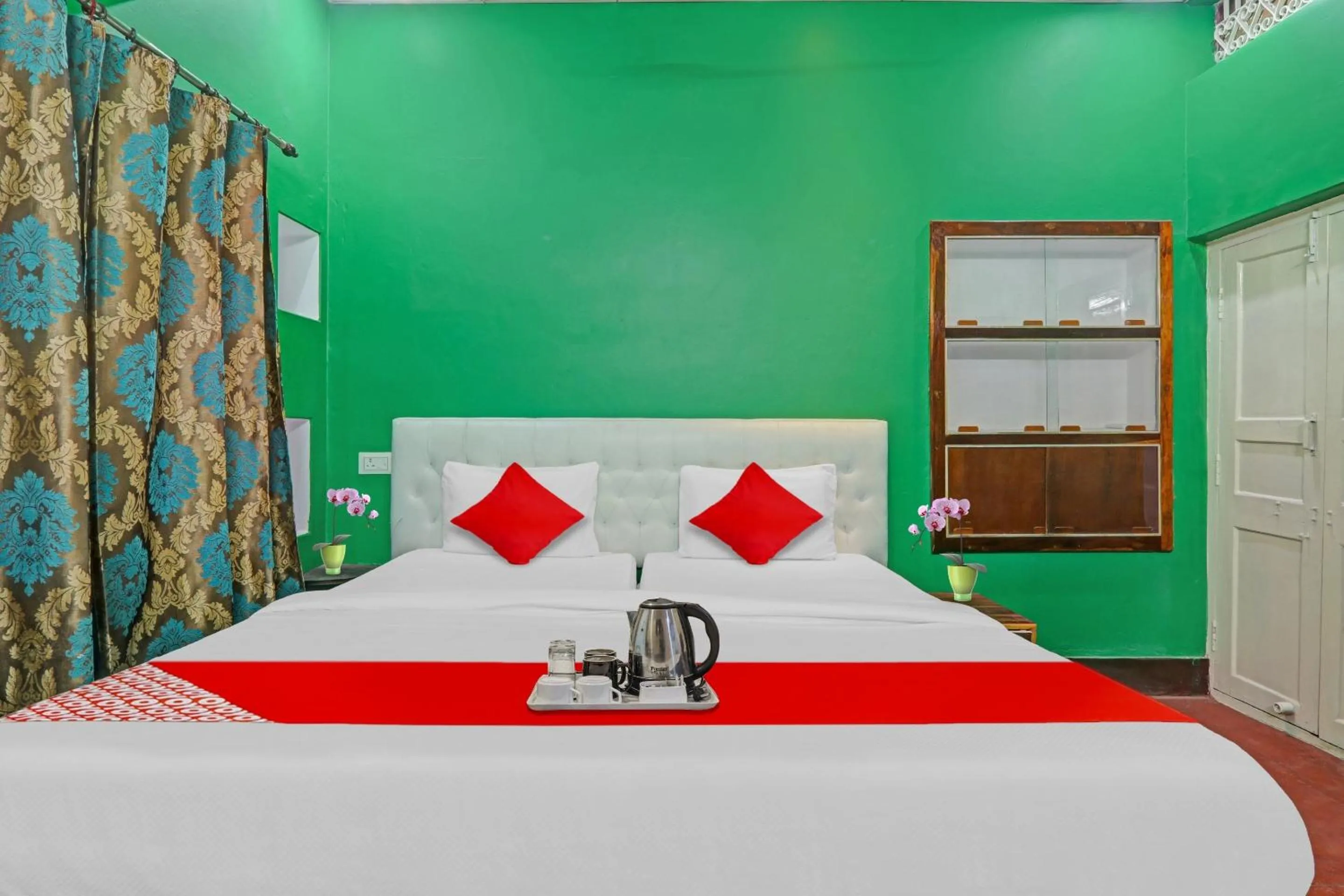 Bedroom in Hotel O Surbhi G House