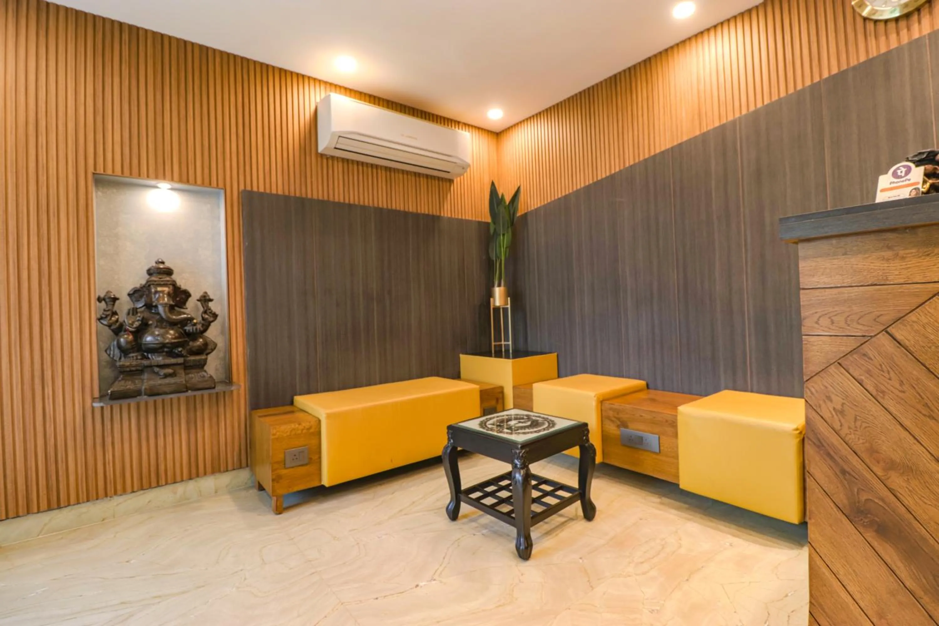 Seating area in FabHotel RR Residency - DLF Cyber City, Gurugram