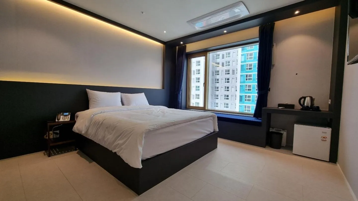 Bedroom in Gold Stone Hotel