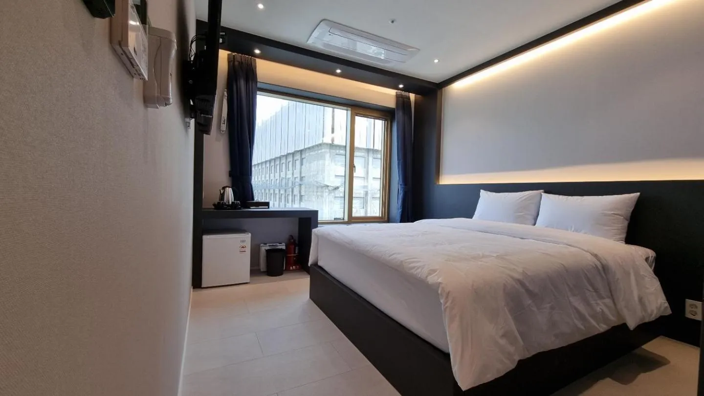 Bedroom in Gold Stone Hotel