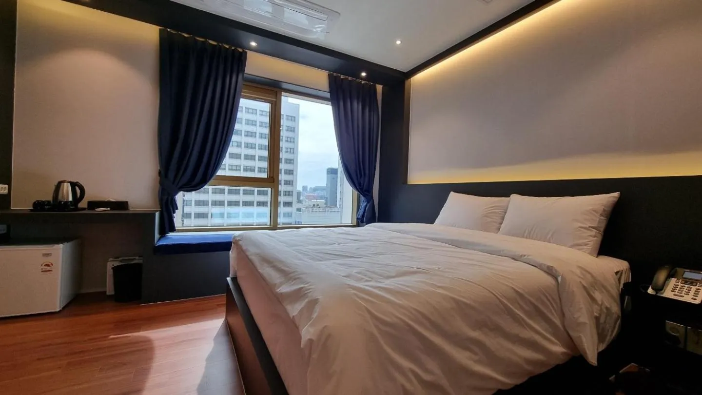 Bedroom in Gold Stone Hotel