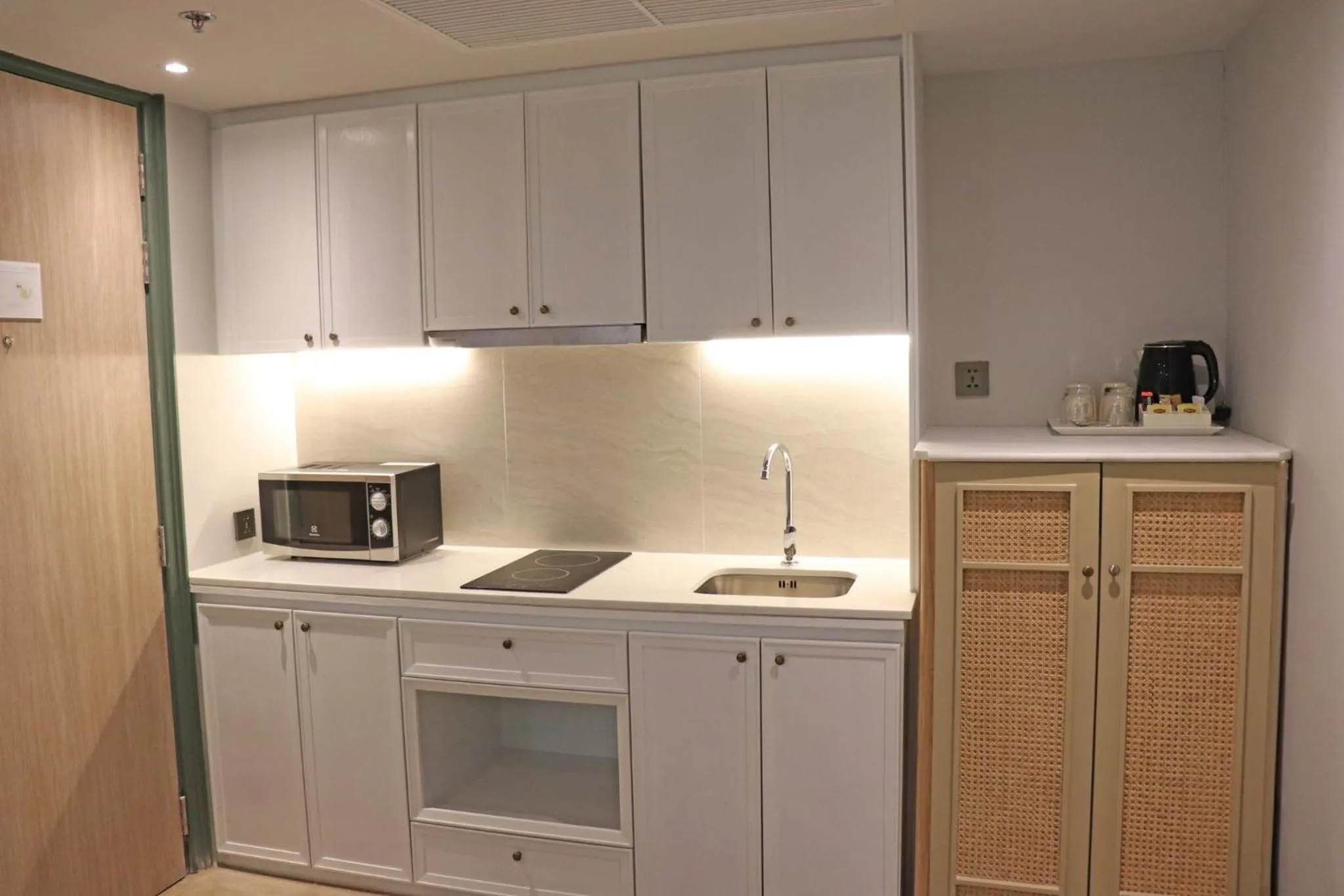 Kitchen or kitchenette in The Quarter Chaophraya by UHG