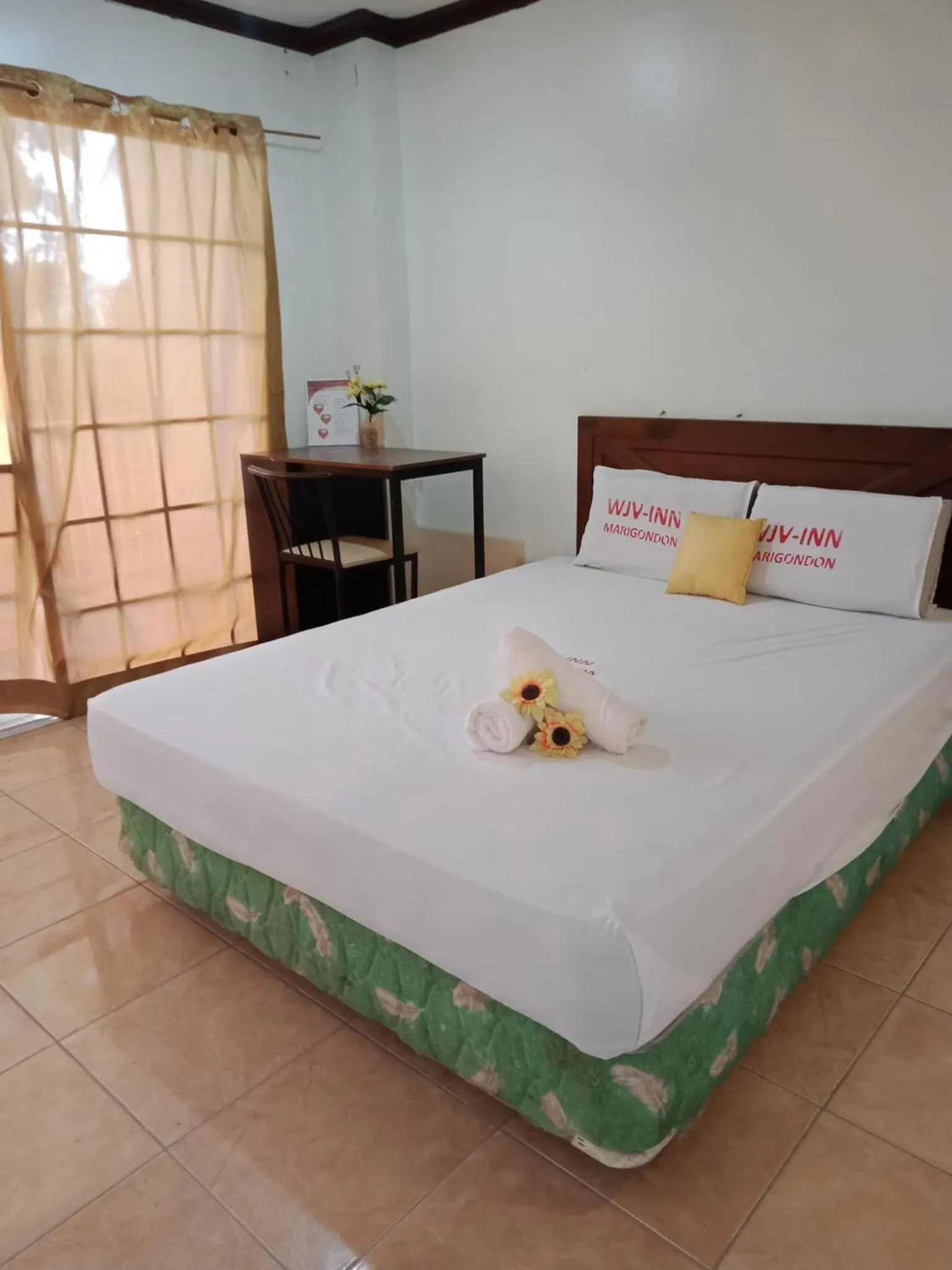 Bed in WJV INN Marigondon