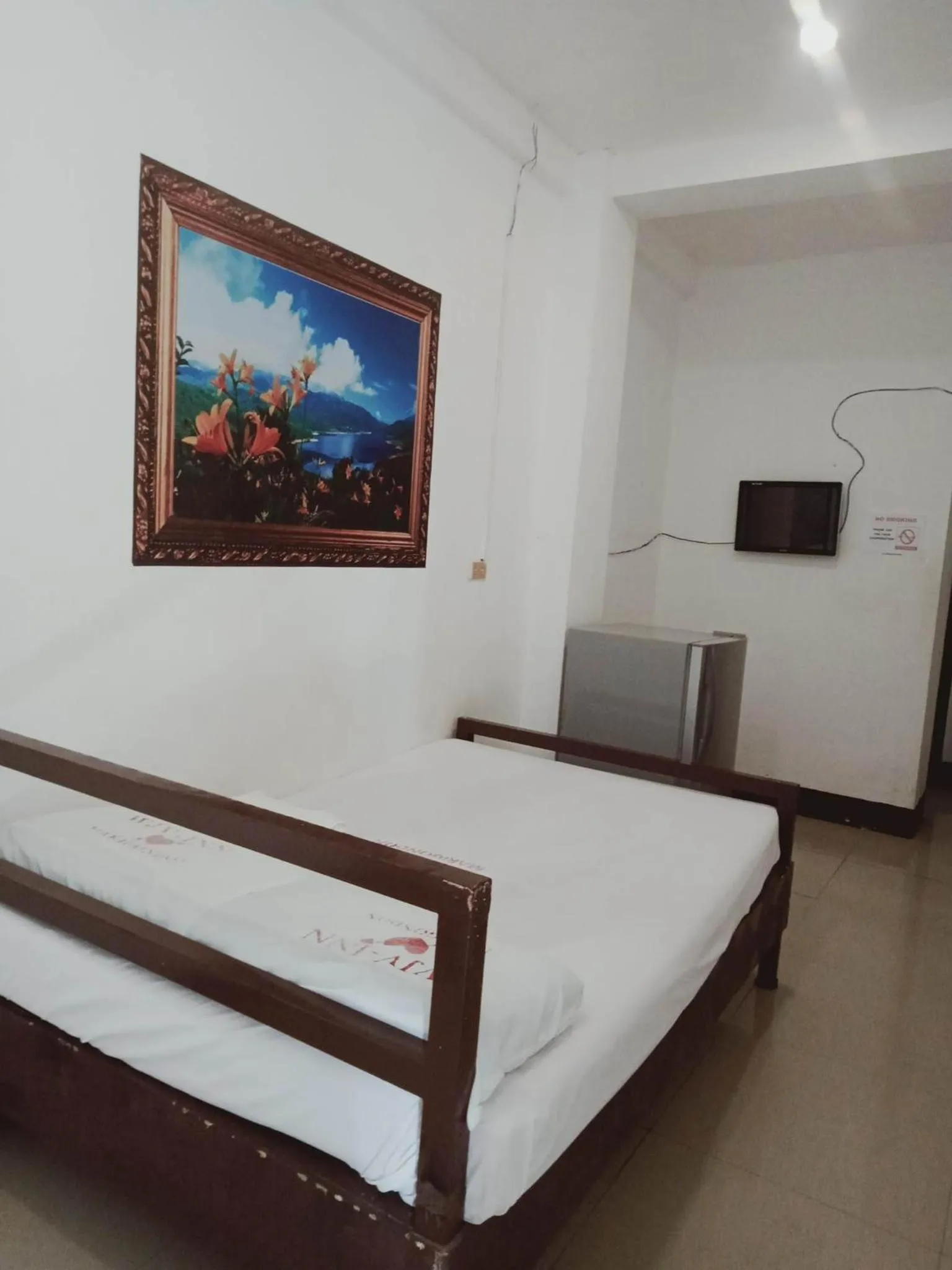 Bed in WJV INN Marigondon