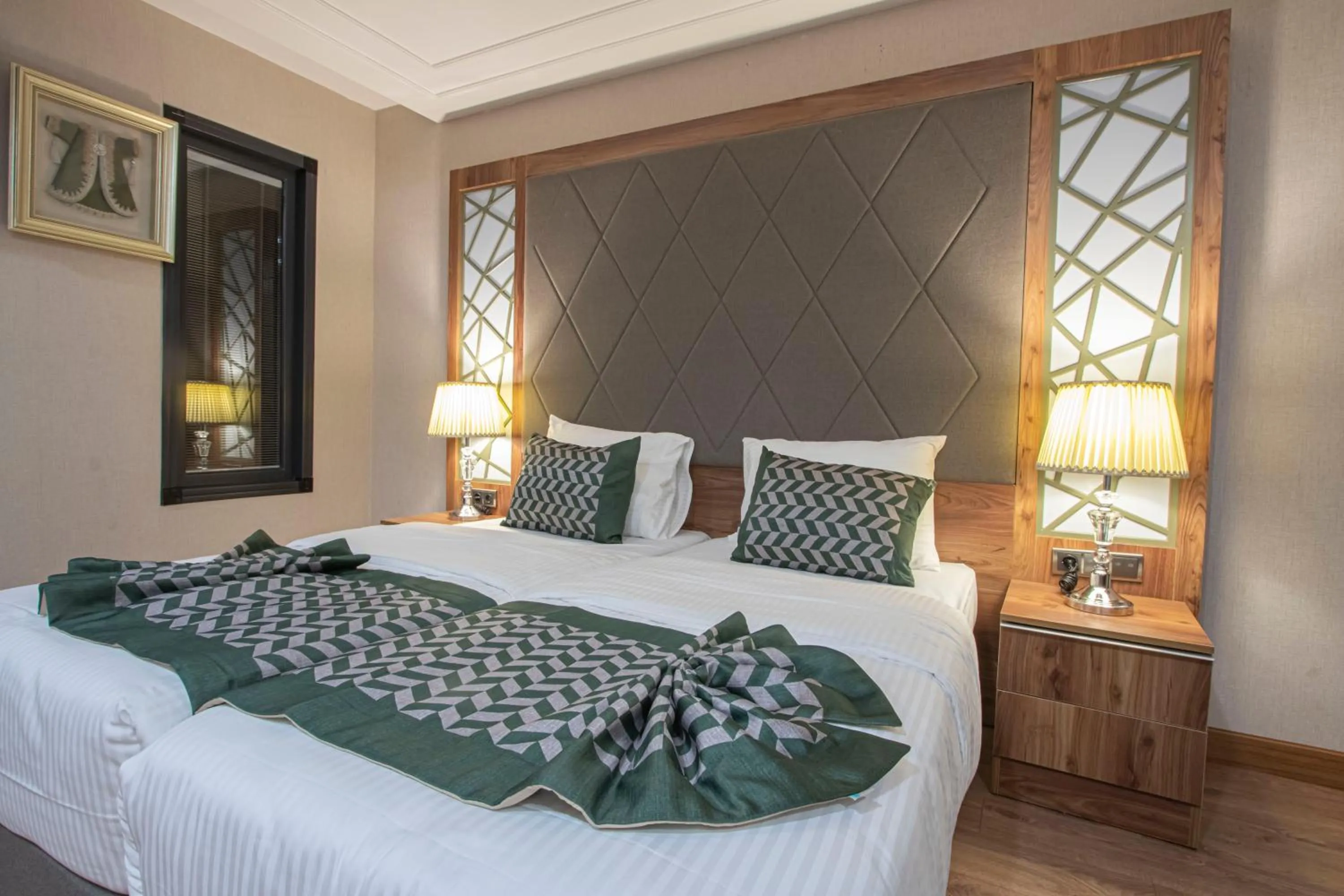 Bed in UNITED HOTEL INTERNATIONAL