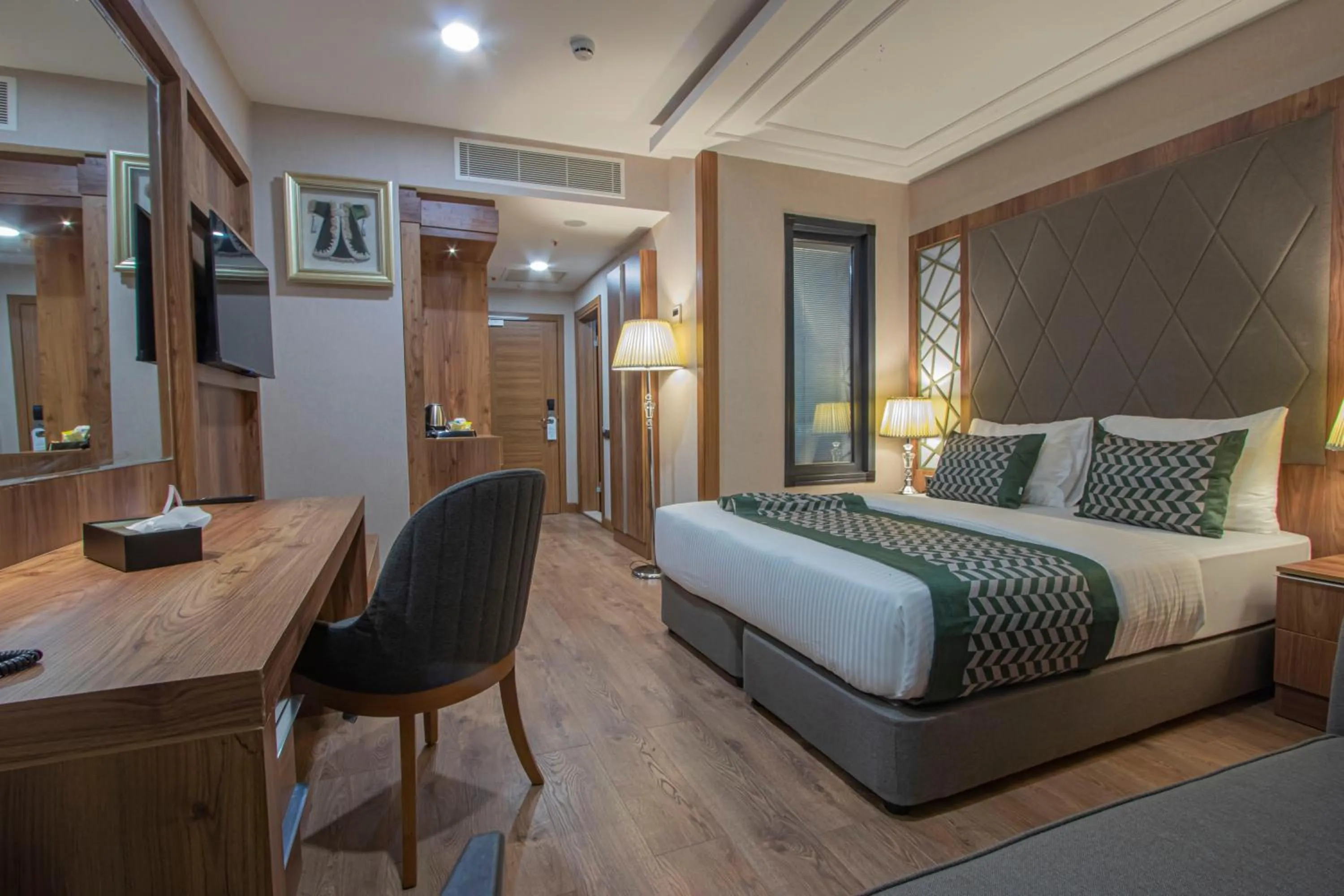 Bed in UNITED HOTEL INTERNATIONAL