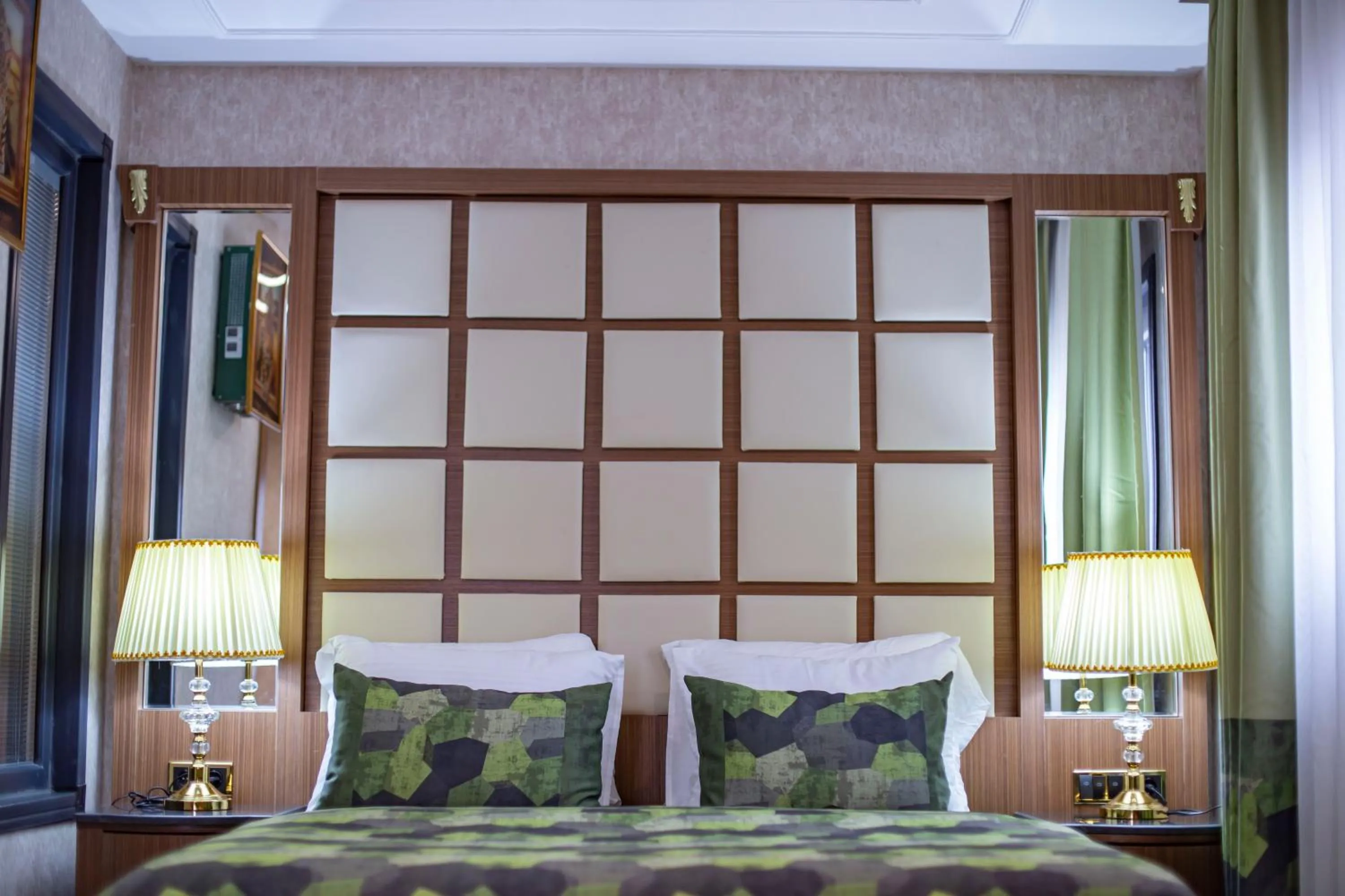 Bed in UNITED HOTEL INTERNATIONAL