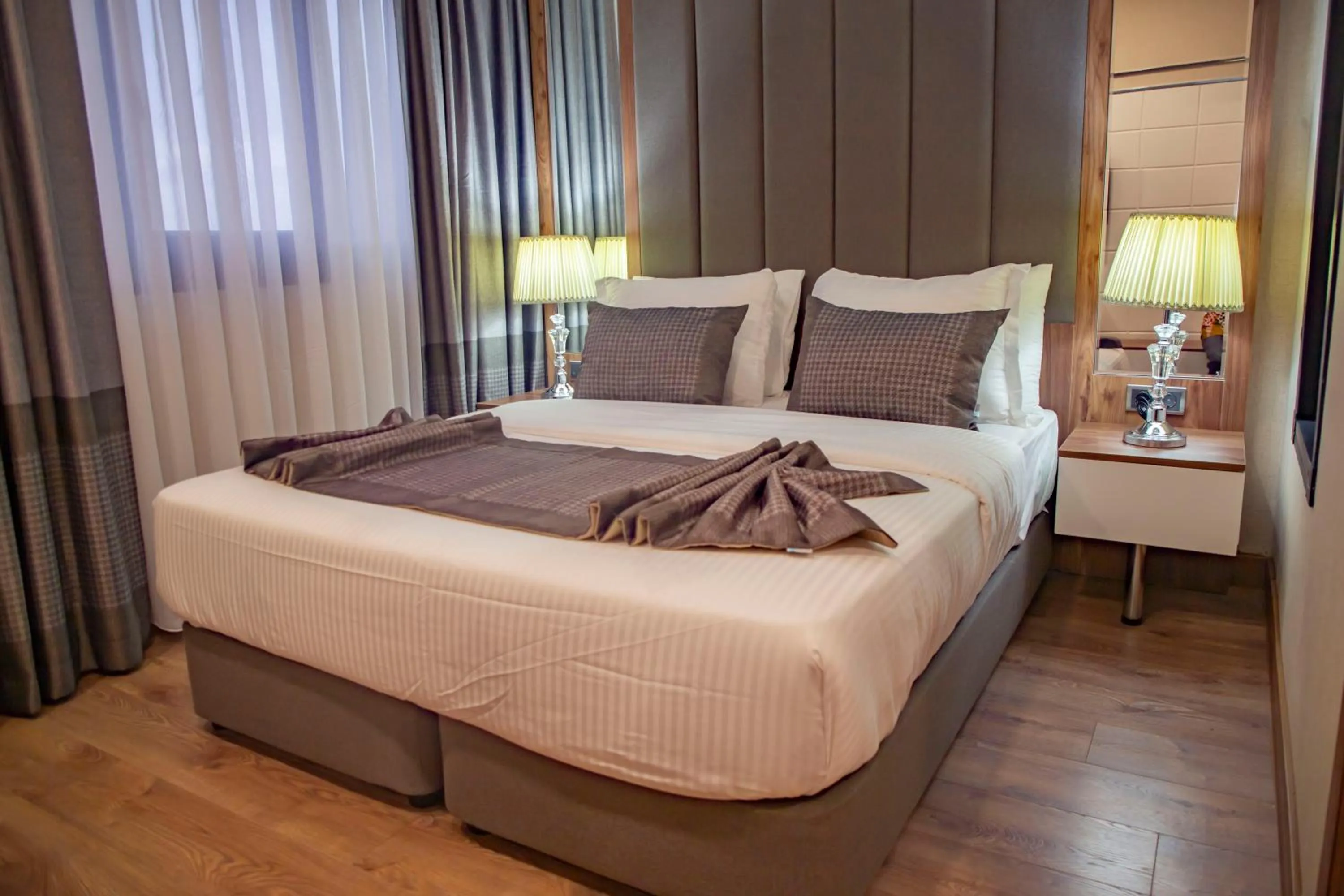 Bed in UNITED HOTEL INTERNATIONAL