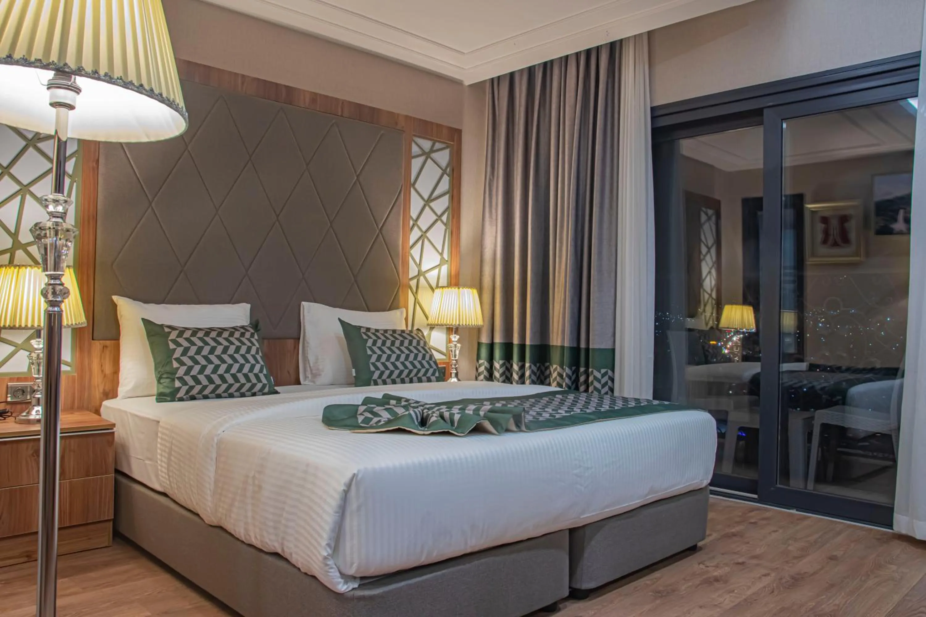 Bed in UNITED HOTEL INTERNATIONAL