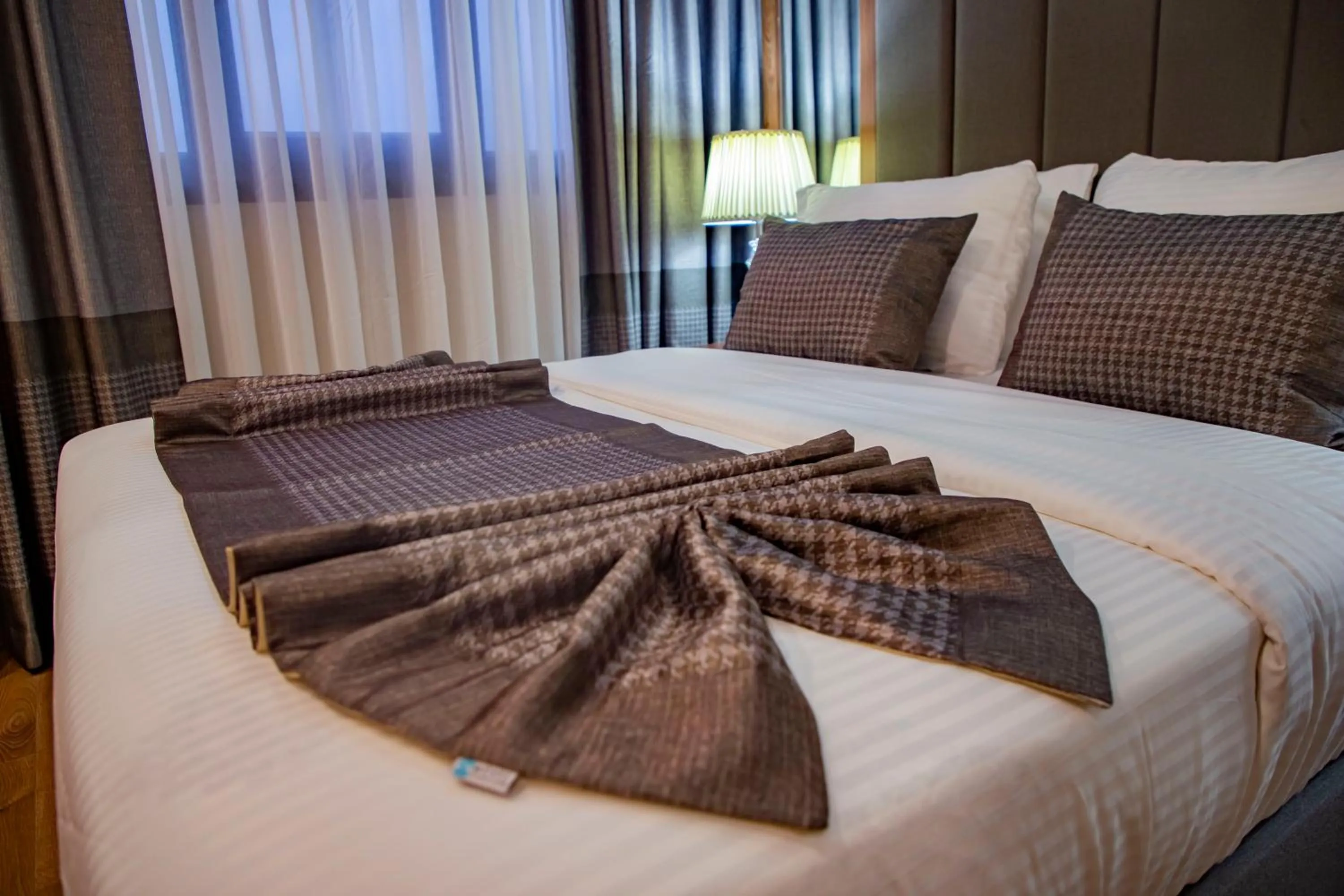 Bed in UNITED HOTEL INTERNATIONAL