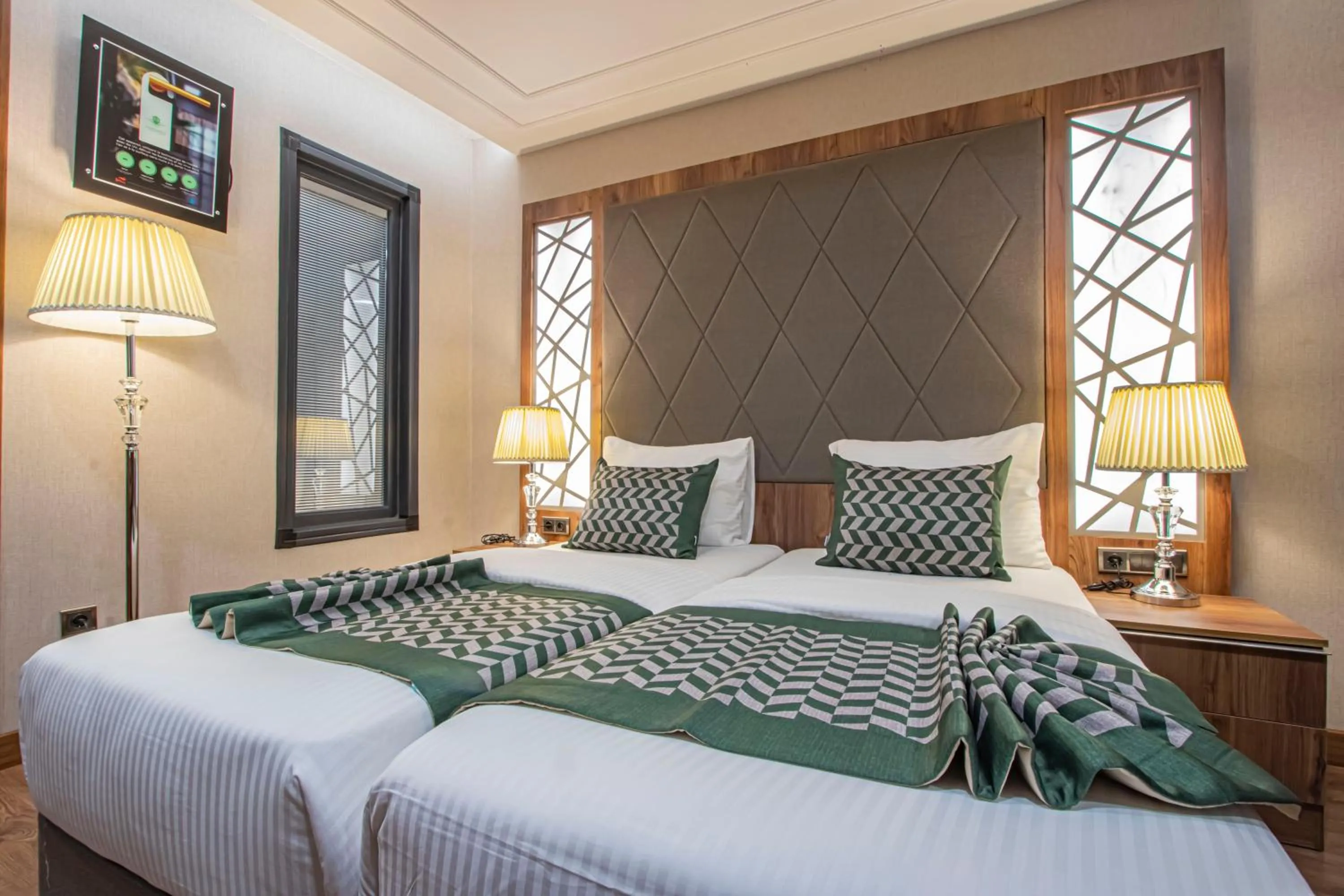 Bed in UNITED HOTEL INTERNATIONAL