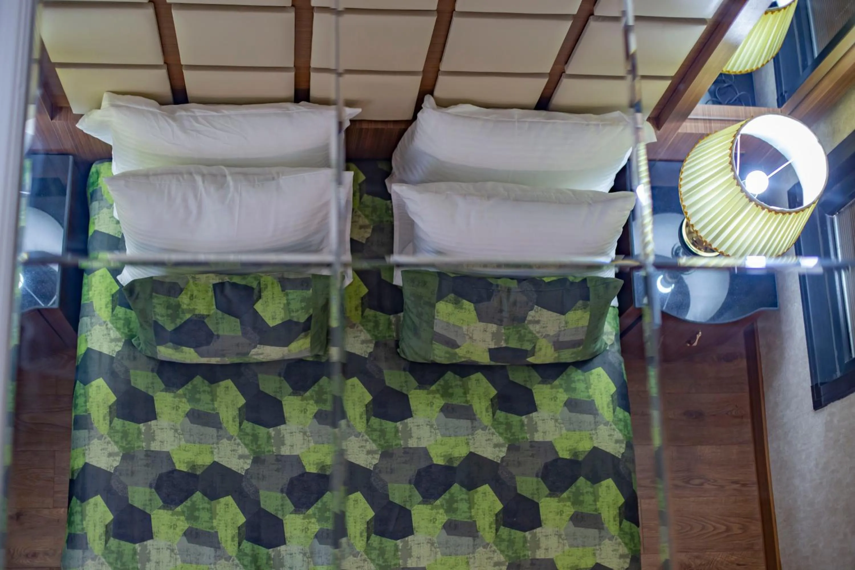 Bed in UNITED HOTEL INTERNATIONAL